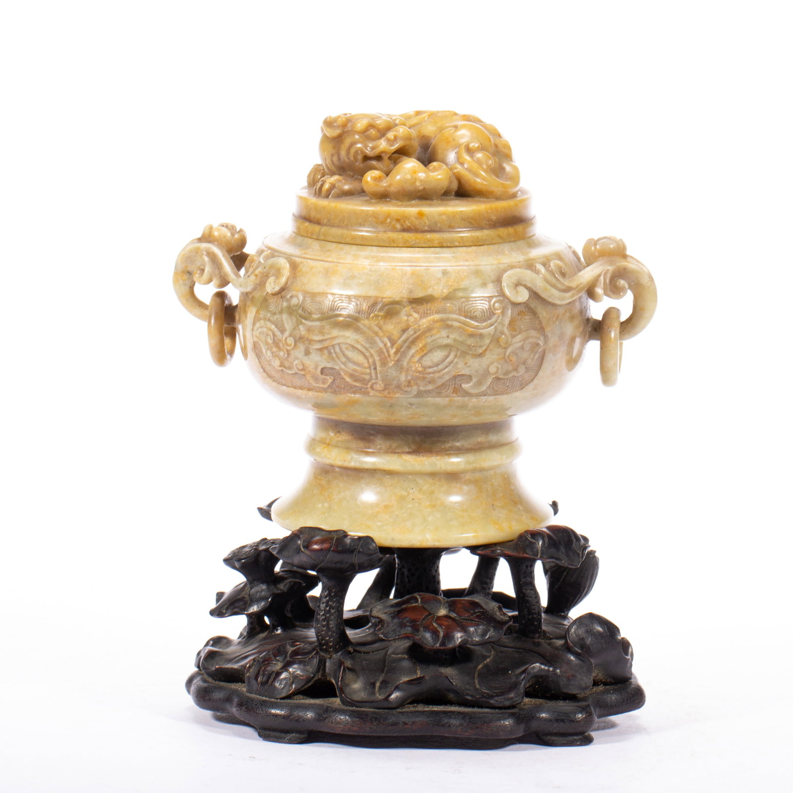 A CHINESE SHOUSHAN STONE LIDDED CENSER WITH LOOSE RING HANDLES: A CHINESE SHOUSHAN STONE LIDDED CENSER WITH LOOSE RING HANDLES This bulbous censer is fully carved from mottled creamy beige Shoushan stone streaked with warm amber russet inclusions. The domed lid is