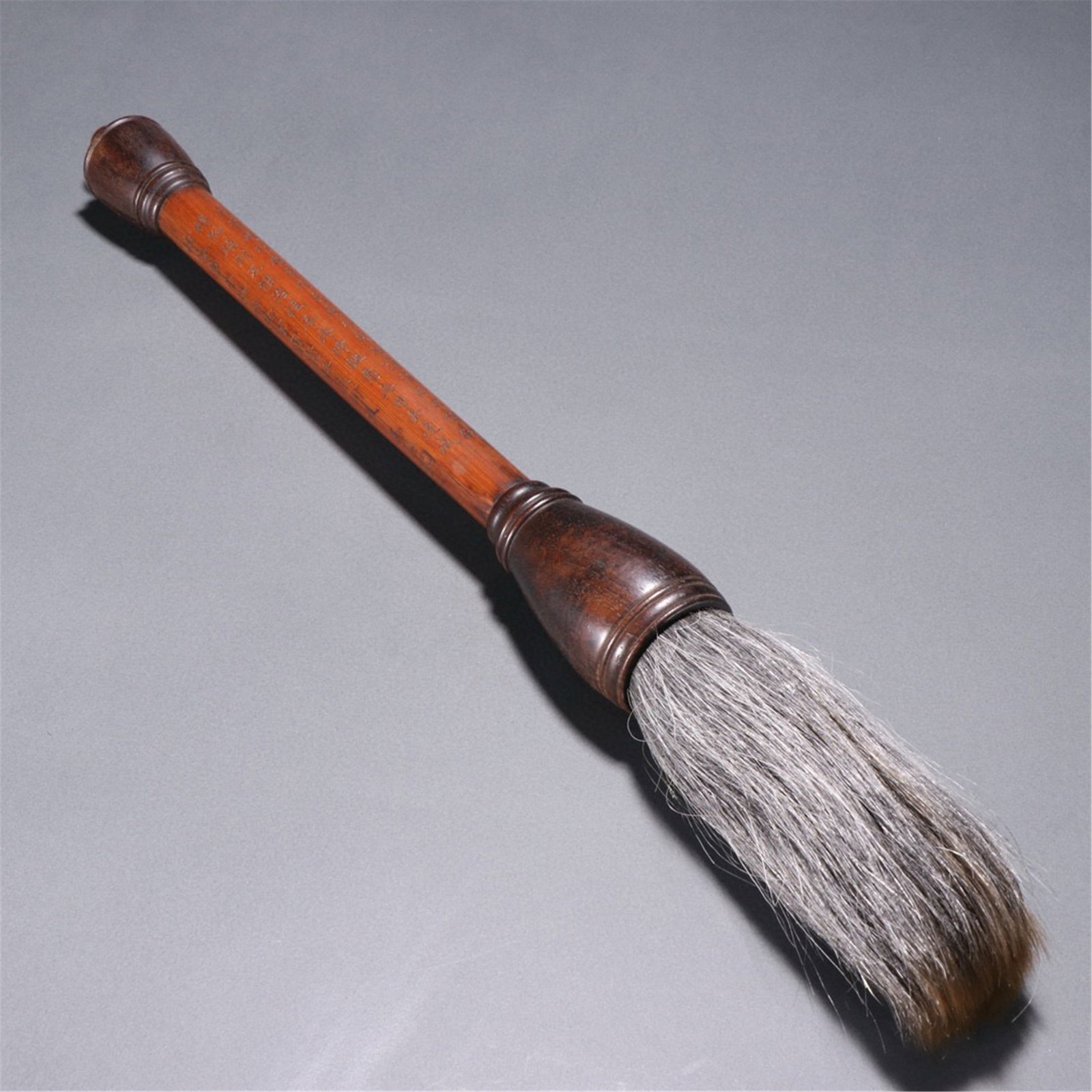 A CHINESE CARVED BAMBOO WRITING BRUSH WITH POETIC INSCRIPTIONS (1 of 9)