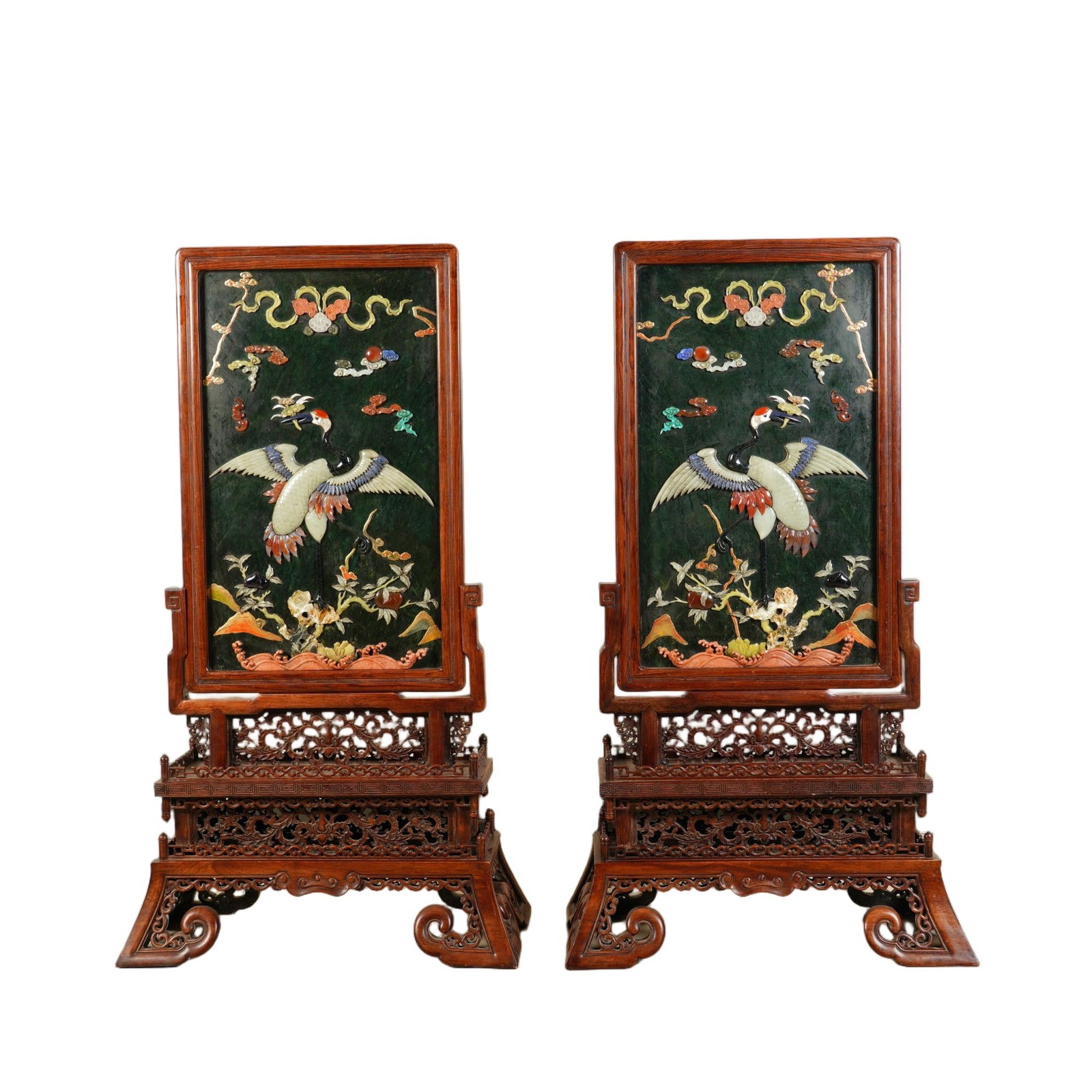 A PAIR OF CHINESE SPINACH JADE INLAID TABLE SCREENS: A PAIR OF CHINESE SPINACH JADE INLAID TABLE SCREENS This matching pair of large table screens each measures 64 cm wide, 31 cm deep and 115 cm in overall height. Each central plaque is carved from deep