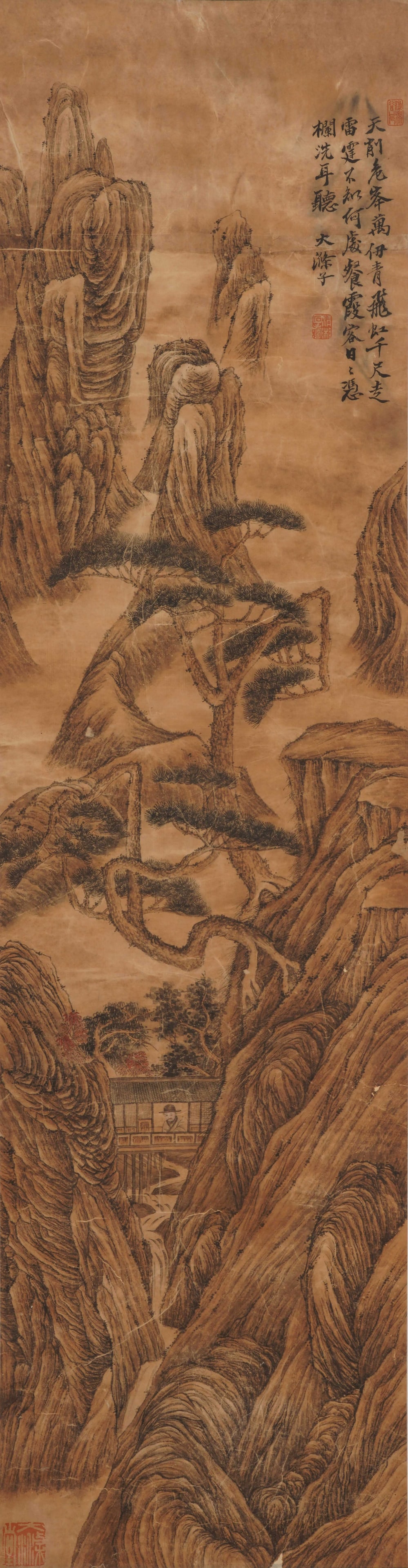 A CHINESE PAINTING OF STREAM AND PEAKS, SIGNED SHI TAO: A CHINESE PAINTING OF STREAM AND PEAKS, SIGNED SHI TAO Vertical monochrome ink landscape on aged amber paper, inscribed, signed and sealed by Shi Tao at the upper right. The dramatic composition featu
