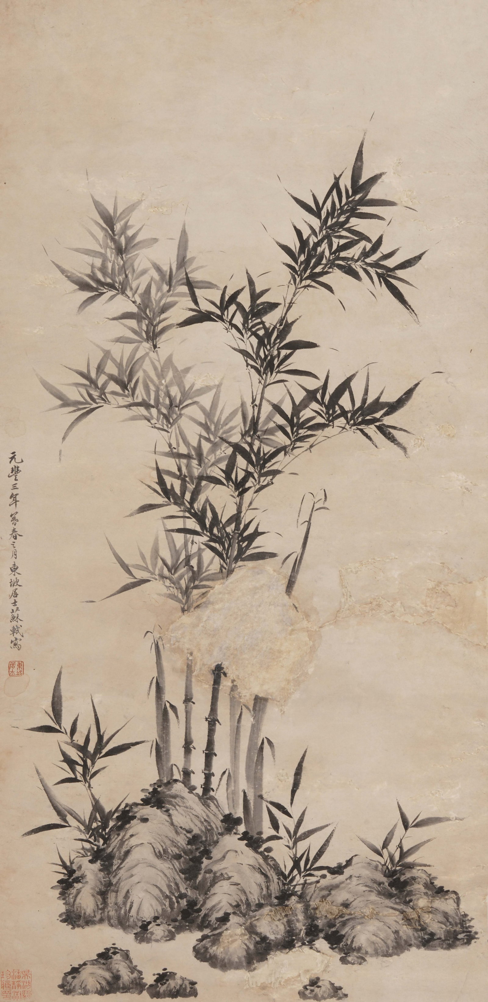 A CHINESE PAINTING OF BAMBOO AND ROCKS, SIGNED SU SHI: A CHINESE PAINTING OF BAMBOO AND ROCKS, SIGNED SU SHI Vertical monochrome ink painting on aged pale rice paper, inscribed, dated and sealed by Su Shi on the left margin. Slender upright bamboo cluster