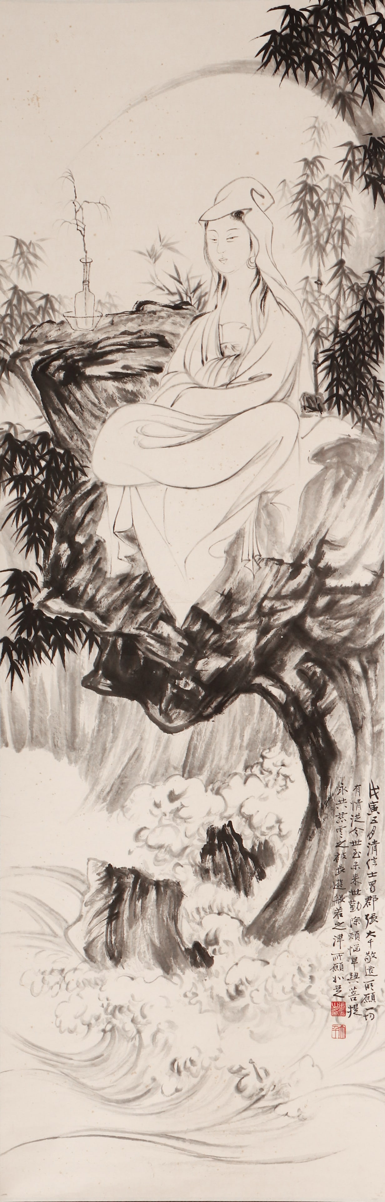 A CHINESE PAINTING OF GUANYIN AMID BAMBOO, SIGNED ZHANG DAQIAN: A CHINESE PAINTING OF GUANYIN AMID BAMBOO, SIGNED ZHANG DAQIAN This vertical monochrome ink on paper work is painted by Zhang Daqian, one of the most celebrated Chinese master painters. The painting d