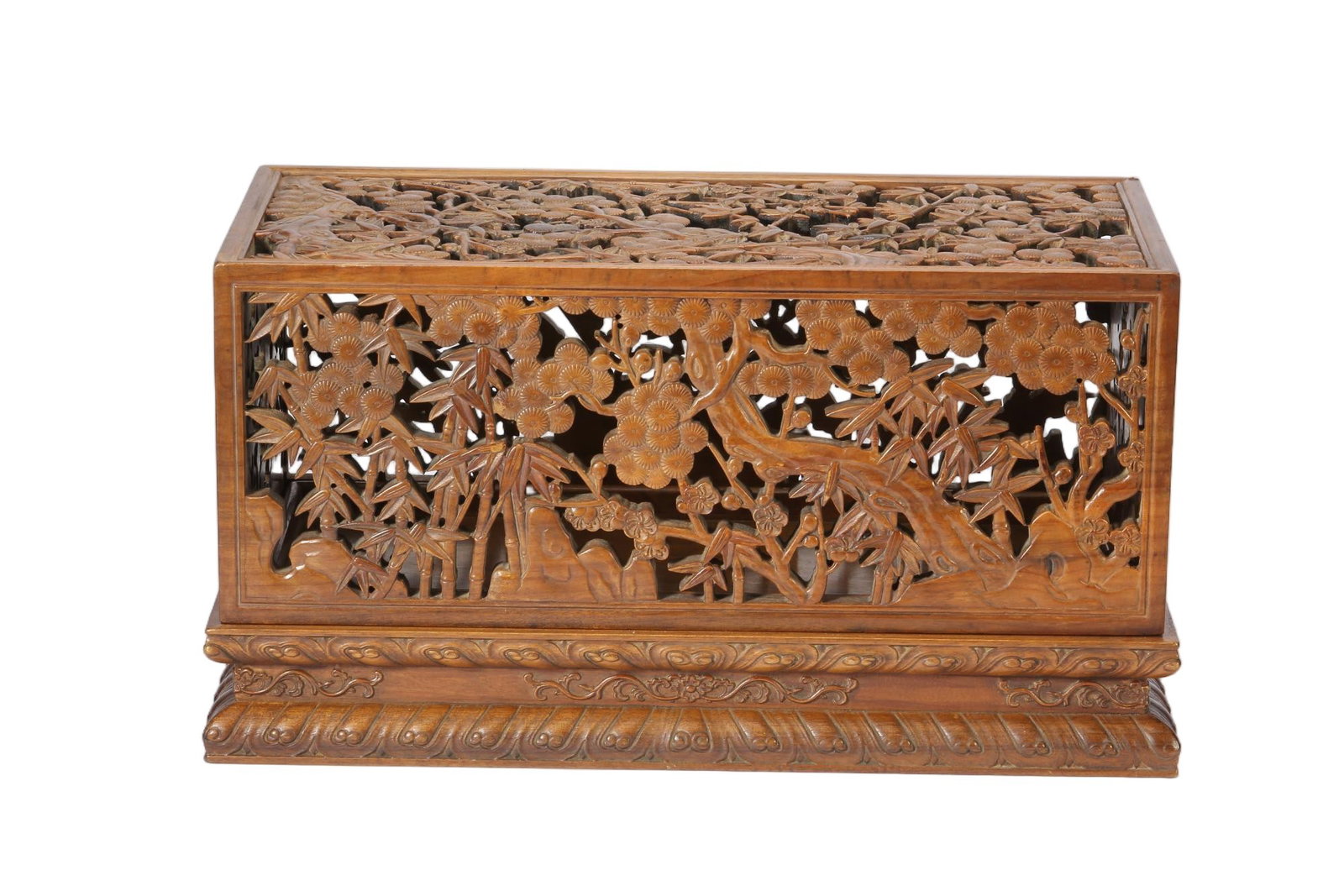 A CHINESE GOLDEN PHOEBE WOOD PIERCED STORAGE CASKET: A CHINESE GOLDEN PHOEBE WOOD PIERCED STORAGE CASKET This rectangular box is entirely crafted from golden phoebe wood with warm natural honey patina and fine grain texture. The four vertical panels and