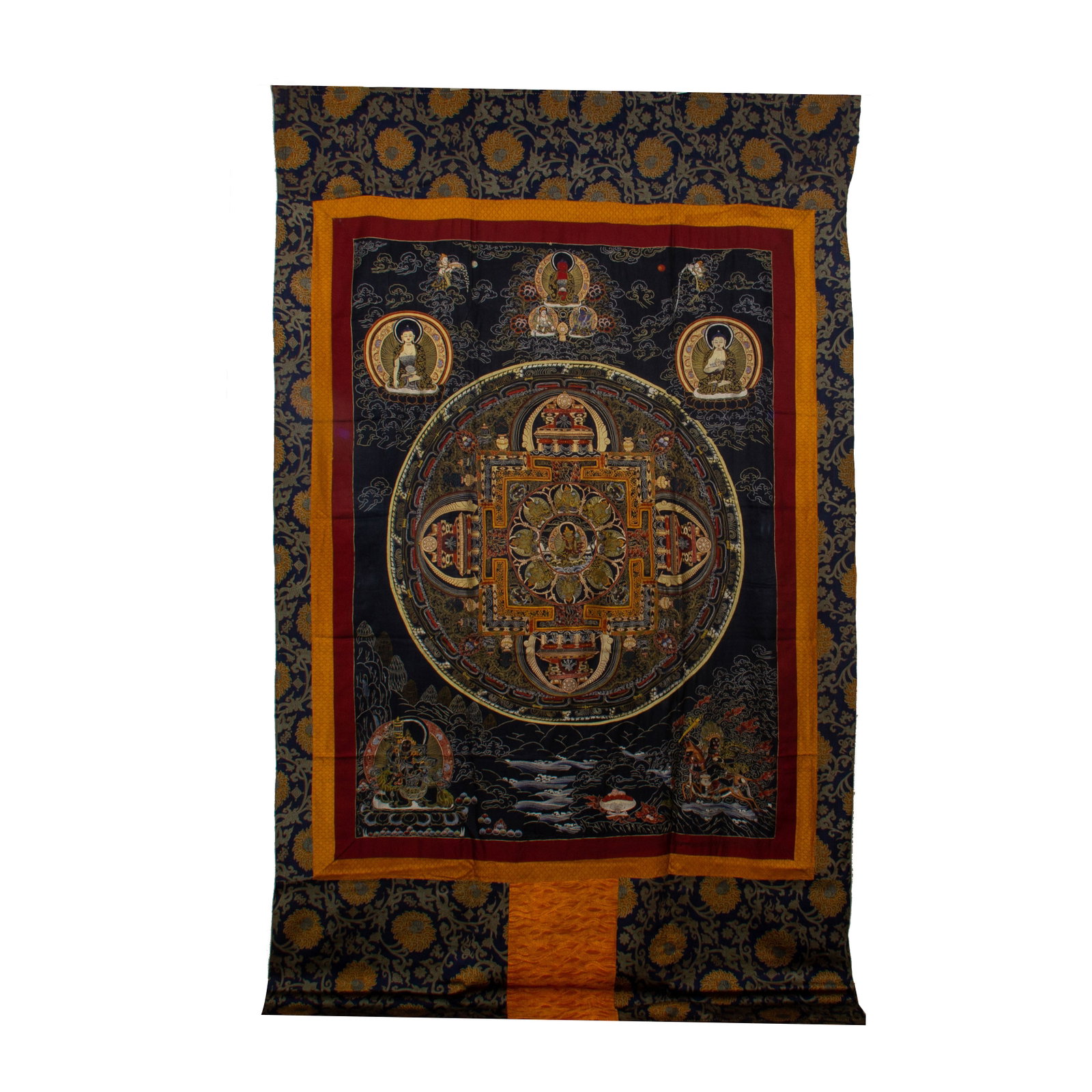 A CHINESE CLOUD BROCADE MANDALA THANGKA: A CHINESE CLOUD BROCADE MANDALA THANGKA This monumental Tibetan mandala thangka is woven from luxurious Chinese cloud brocade, featuring a symmetrical central cosmic palace mandala enshrining a seated