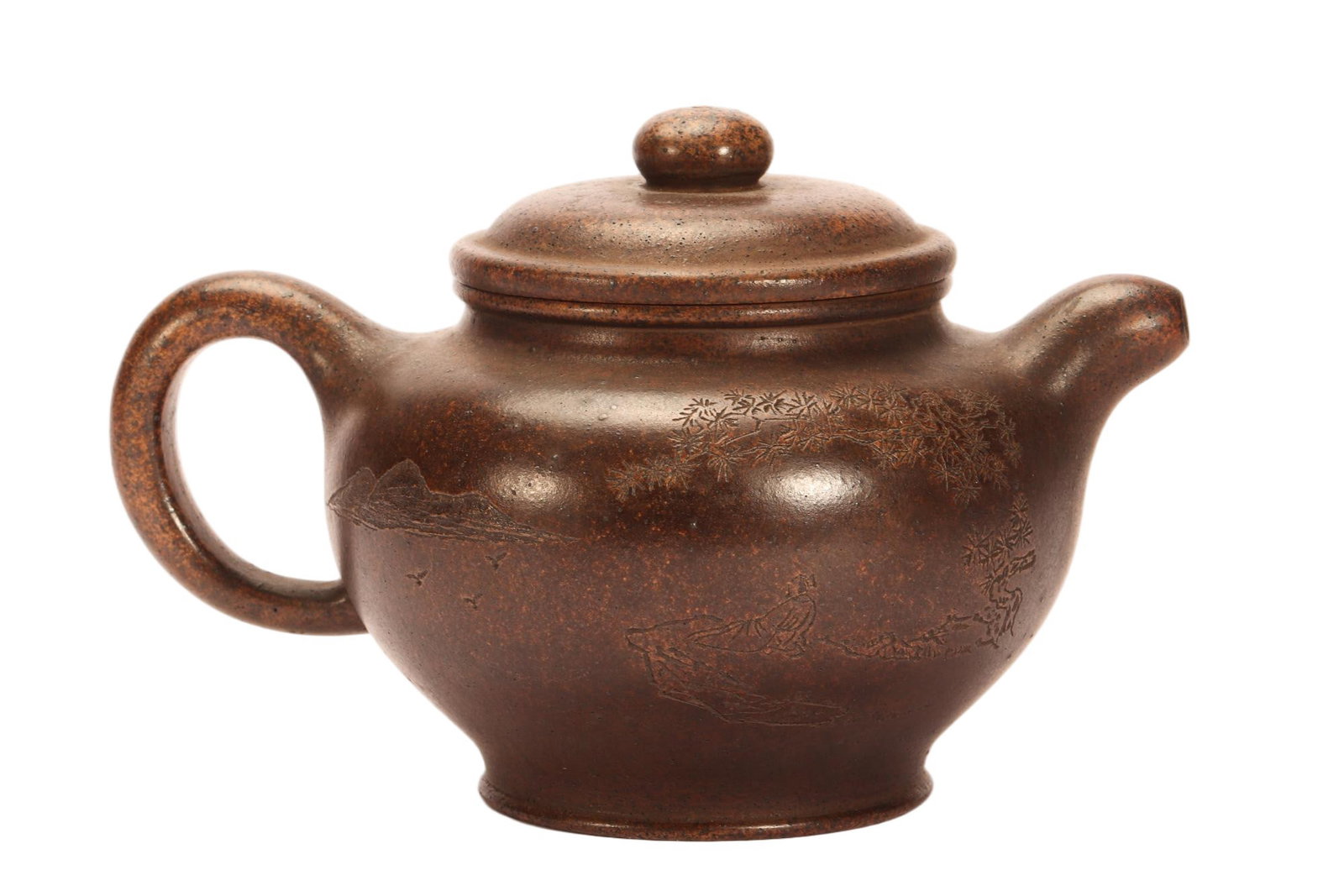 A CHINESE INCISED LANDSCAPE ZISHA TEAPOT: A CHINESE INCISED LANDSCAPE ZISHA TEAPOT This elegant bulbous teapot is shaped from mottled dark brown Yixing zisha clay with fine mineral speckling across its smooth polished surface. The rounded bod