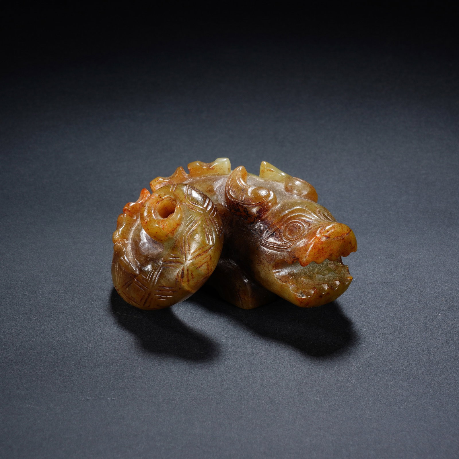 A CHINESE ARCHAIC COILED JADE DRAGON PENDANT (1 of 8)