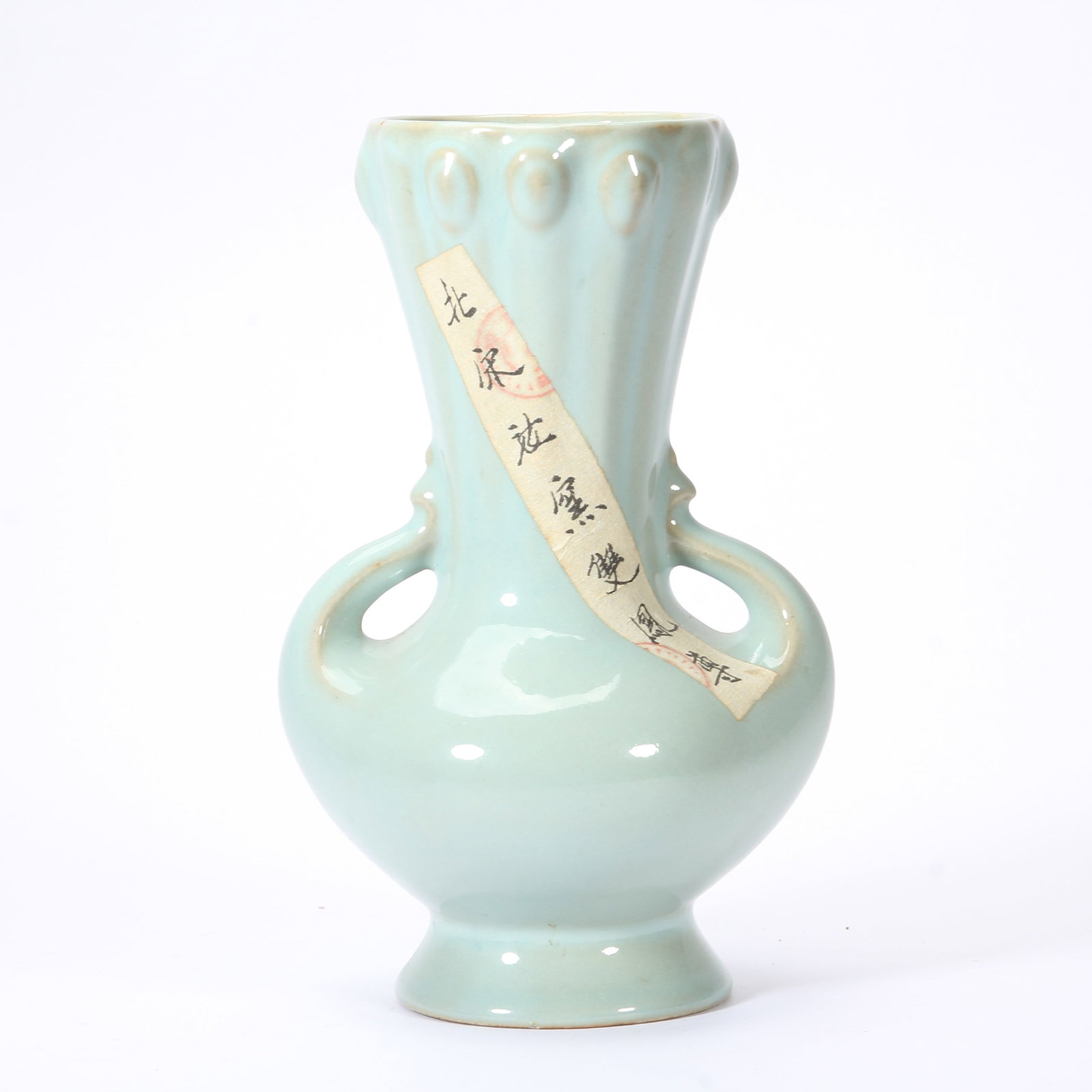 A CHINESE RU-TYPE CELADON DOUBLE LOOP HANDLED VASE: A CHINESE RU-TYPE CELADON DOUBLE LOOP HANDLED VASE This elegant porcelain vase is fully covered in soft, uniform pale sky-blue celadon glaze with a gentle silky luster characteristic of Ru wares. It f