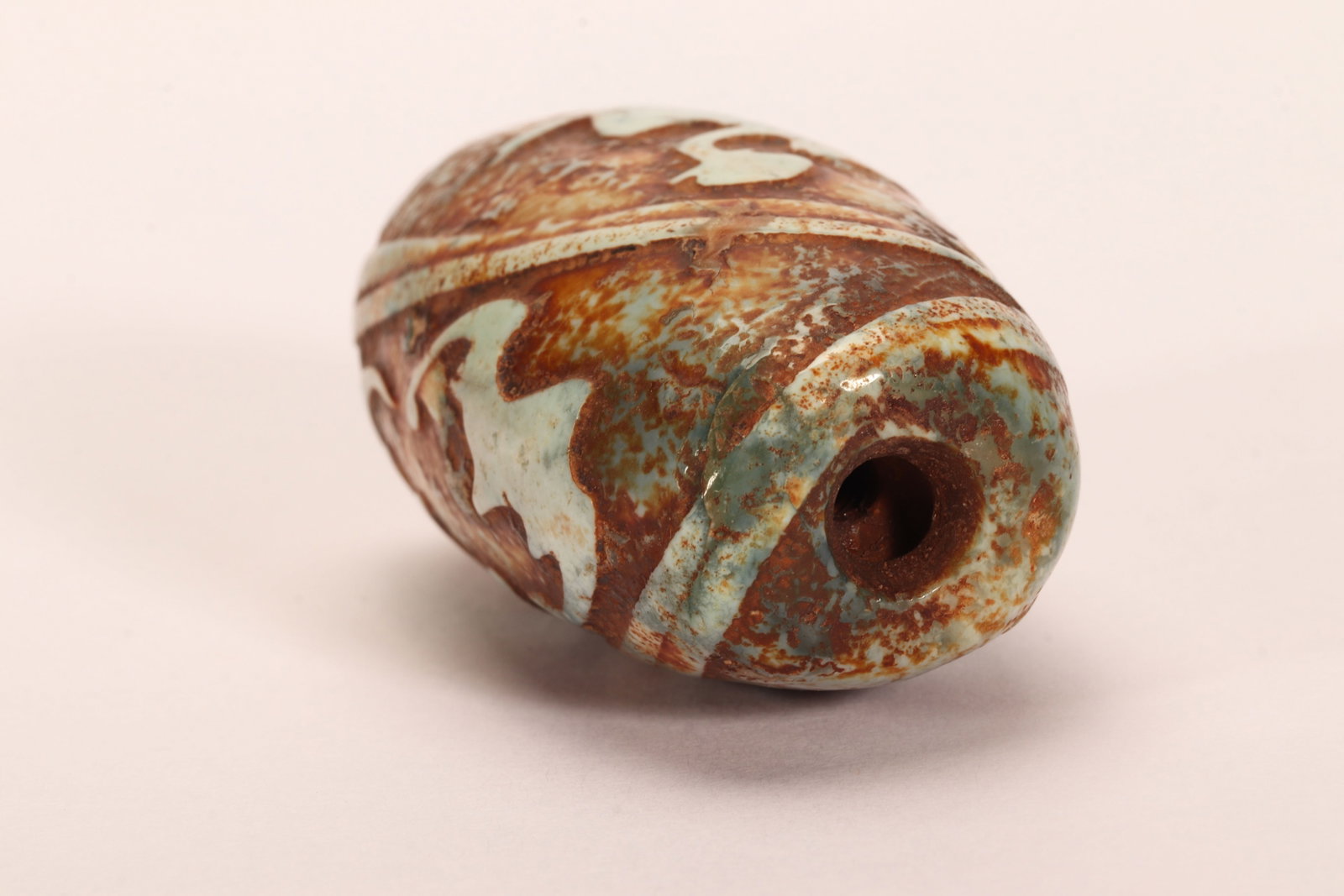 A CHINESE PATTERNED DZI BEAD - 7