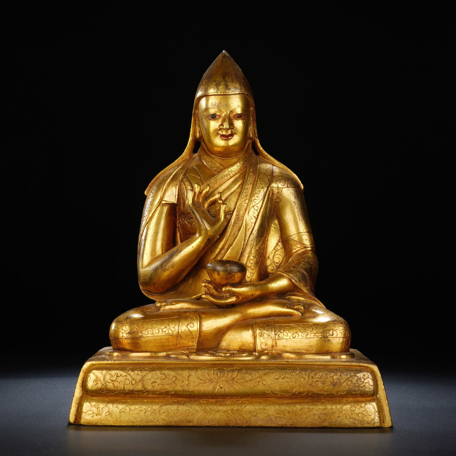 A CHINESE GILT BRONZE GURU SEATED FIGURE (1 of 11)