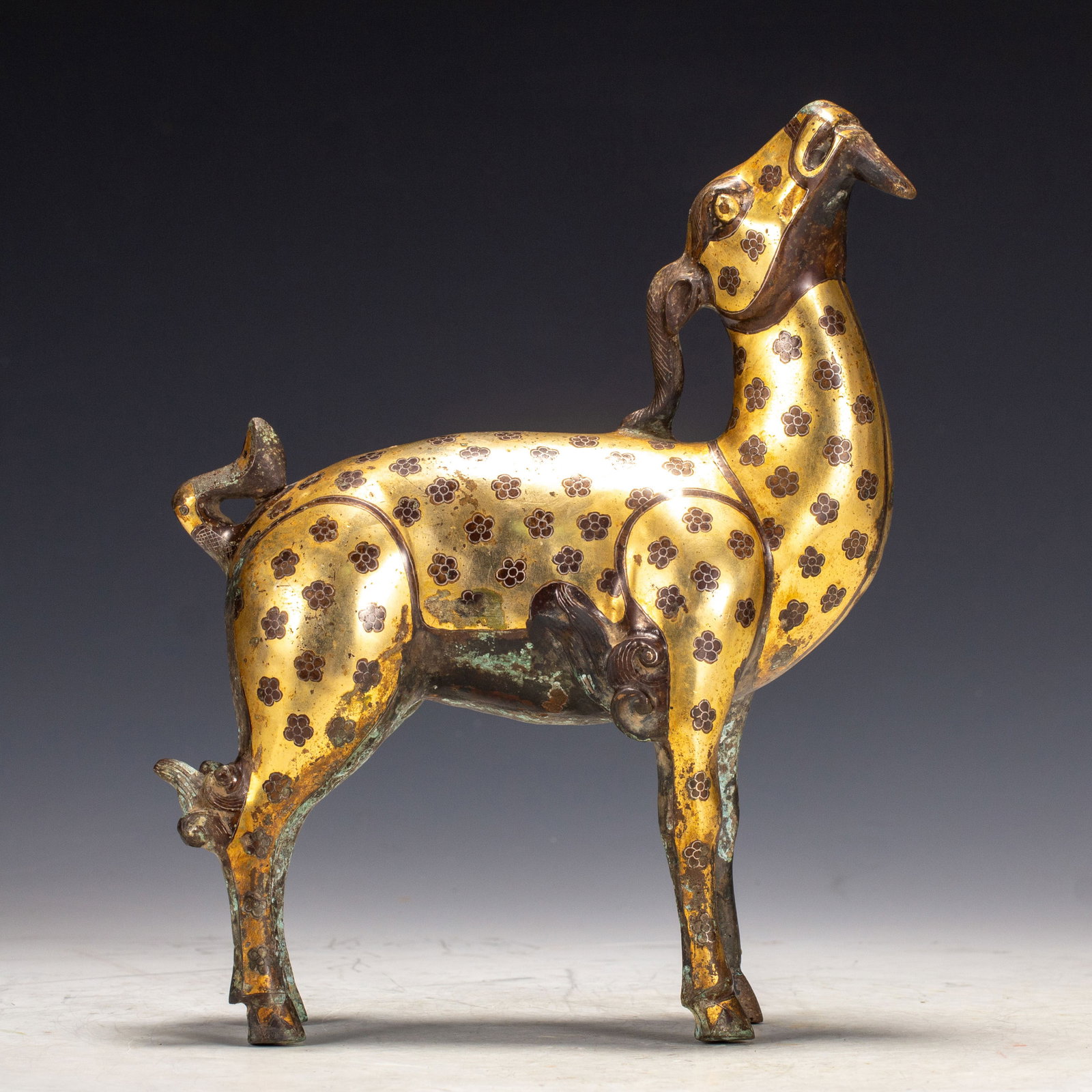 A CHINESE BRONZE DEER INLAID WITH GOLD AND SILVER FILIGREE (1 of 14)