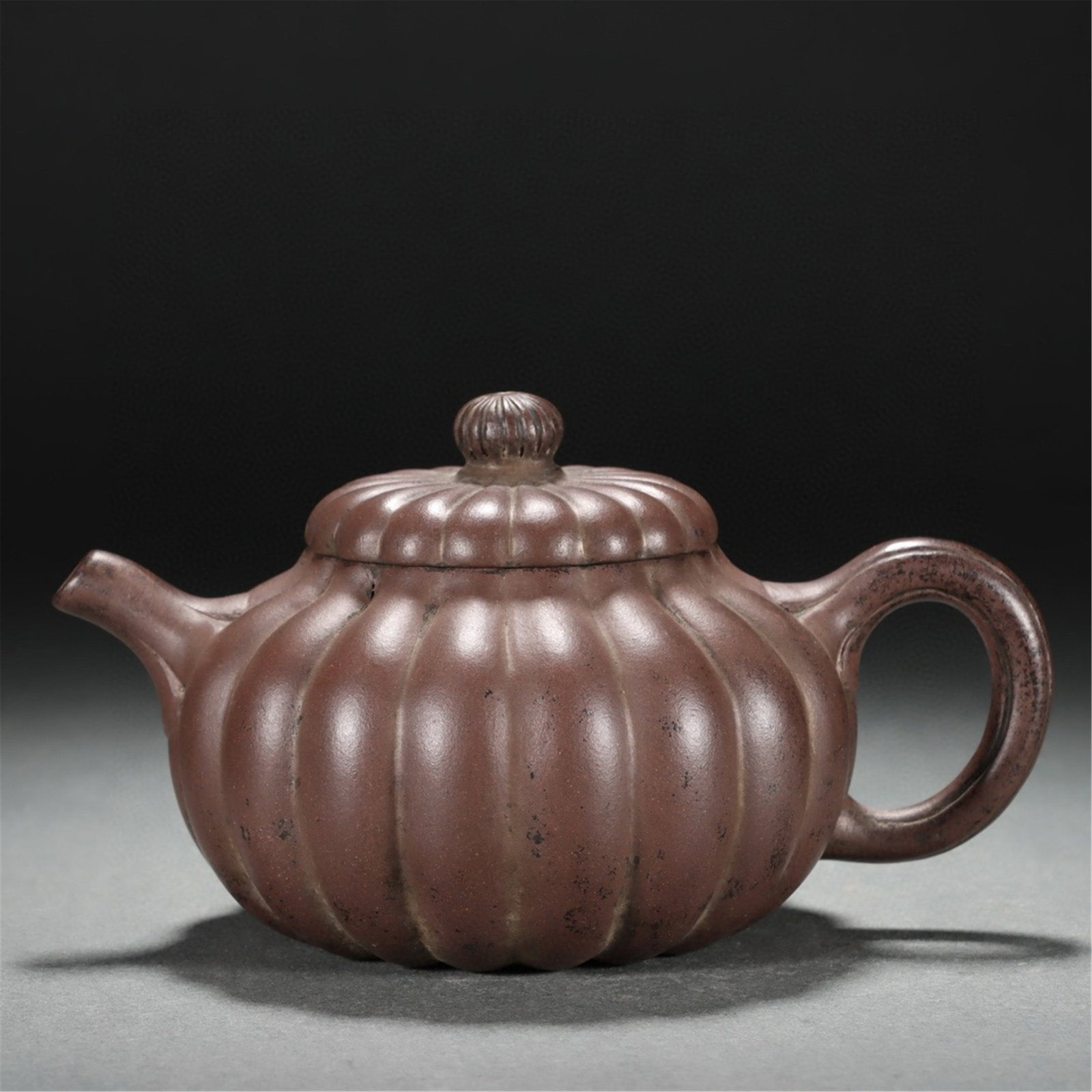 A CHINESE LOBED ZISHA TEAPOT (1 of 9)