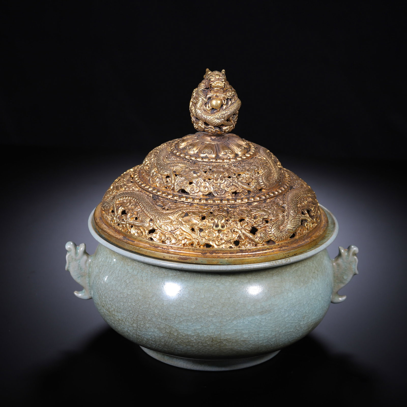 A CHINESE CELADON CENSER WITH GILT COVER (1 of 9)