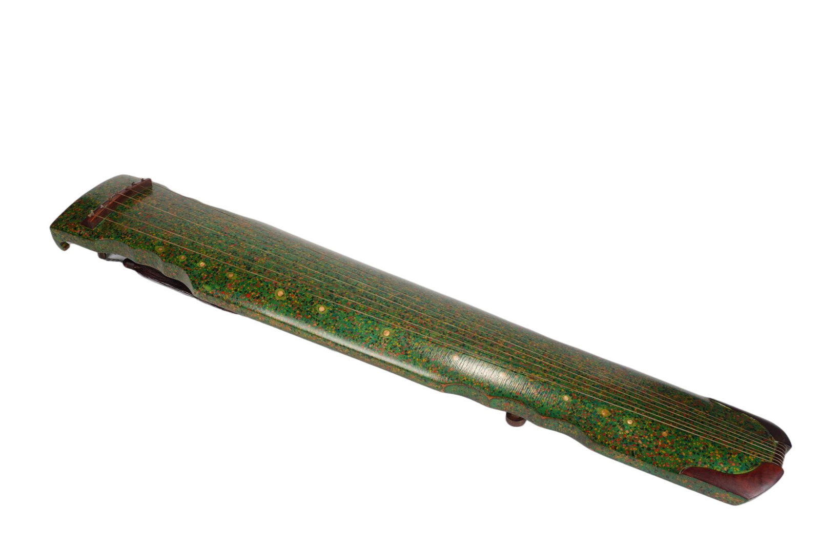 A CHINESE SPECKLED LACQUER GUQIN: A CHINESE SPECKLED LACQUER GUQIN This single seven-stringed guqin measures 20 cm wide, 10 cm deep and 122 cm in full length. Its entire surface is coated in rich multi-tonal speckled lacquer dominated