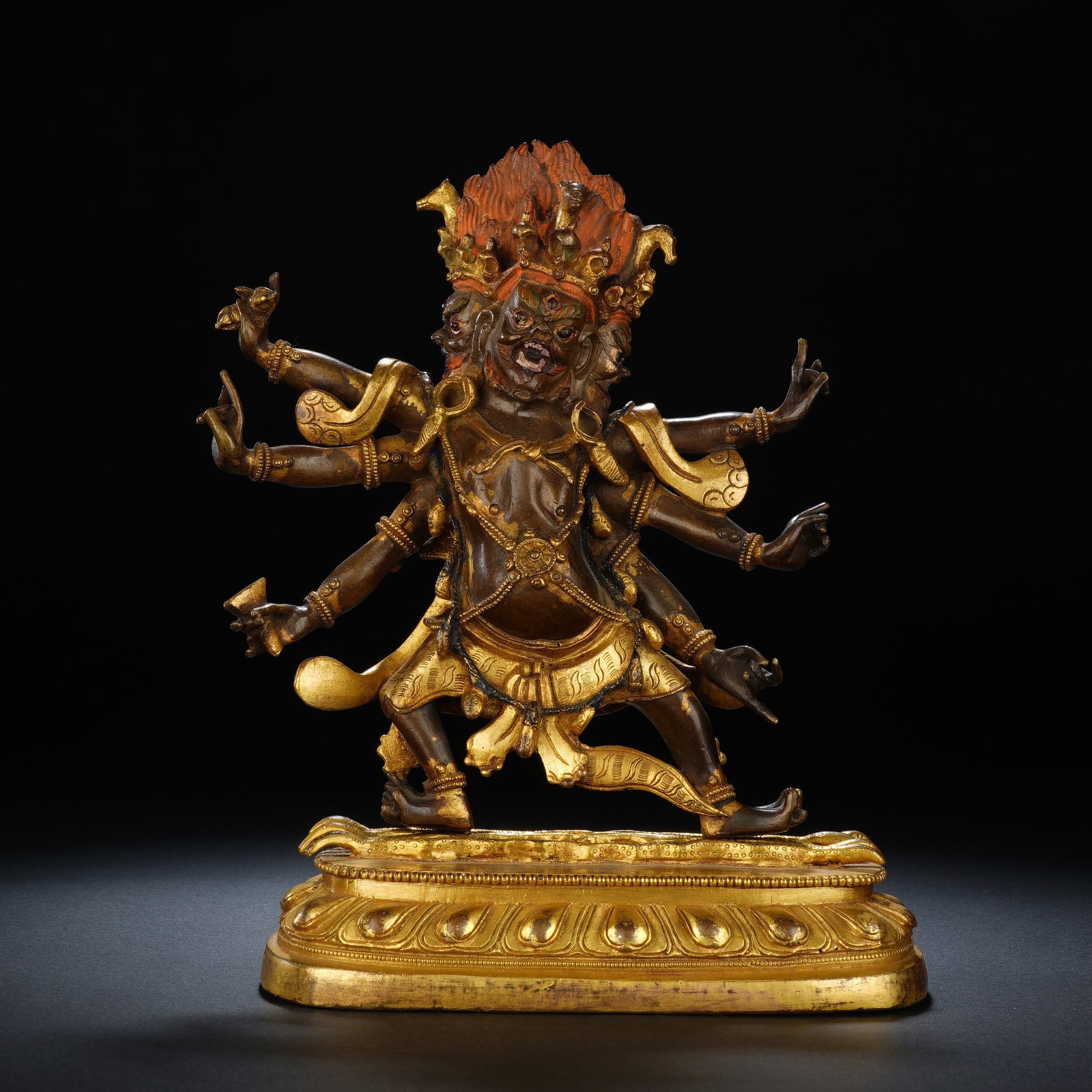 A CHINESE PARTIALLY GILT BRONZE DHARMAPALA STATUE (1 of 10)