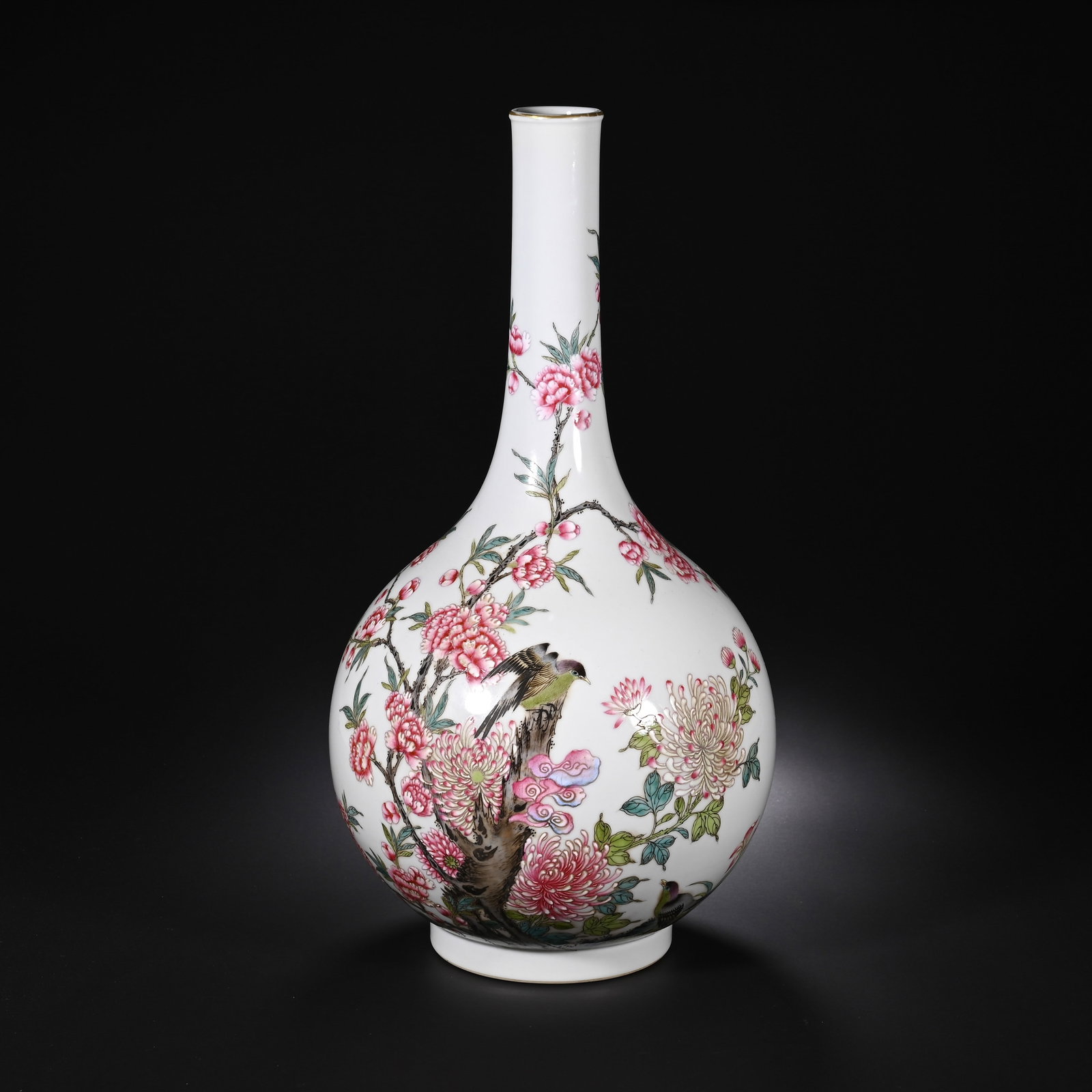A CHINESE FAMILLE ROSE FLORAL AND BIRD DAN VASE: A CHINESE FAMILLE ROSE FLORAL AND BIRD DAN VASE This elegant gallbladder-form vase boasts a smooth white porcelain body with a slender upright neck tapering to a small gilded rim, rising from a stout 