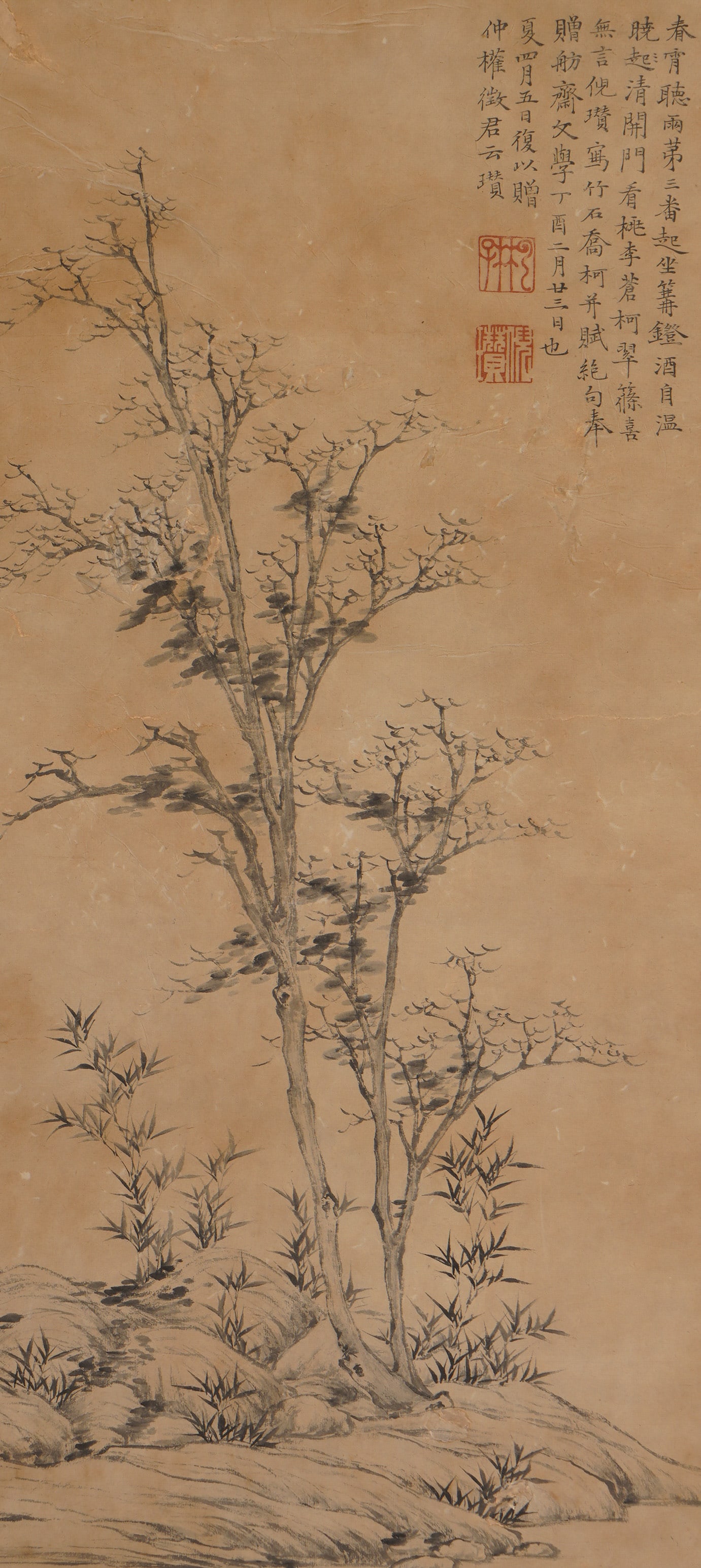 A CHINESE PAINTING OF TREES AND BAMBOO, SIGNED NI ZAN: A CHINESE PAINTING OF TREES AND BAMBOO, SIGNED NI ZAN Vertical monochrome ink painting on aged warm toned paper, inscribed, signed and sealed by Ni Zan at the upper right. The minimalist composition f