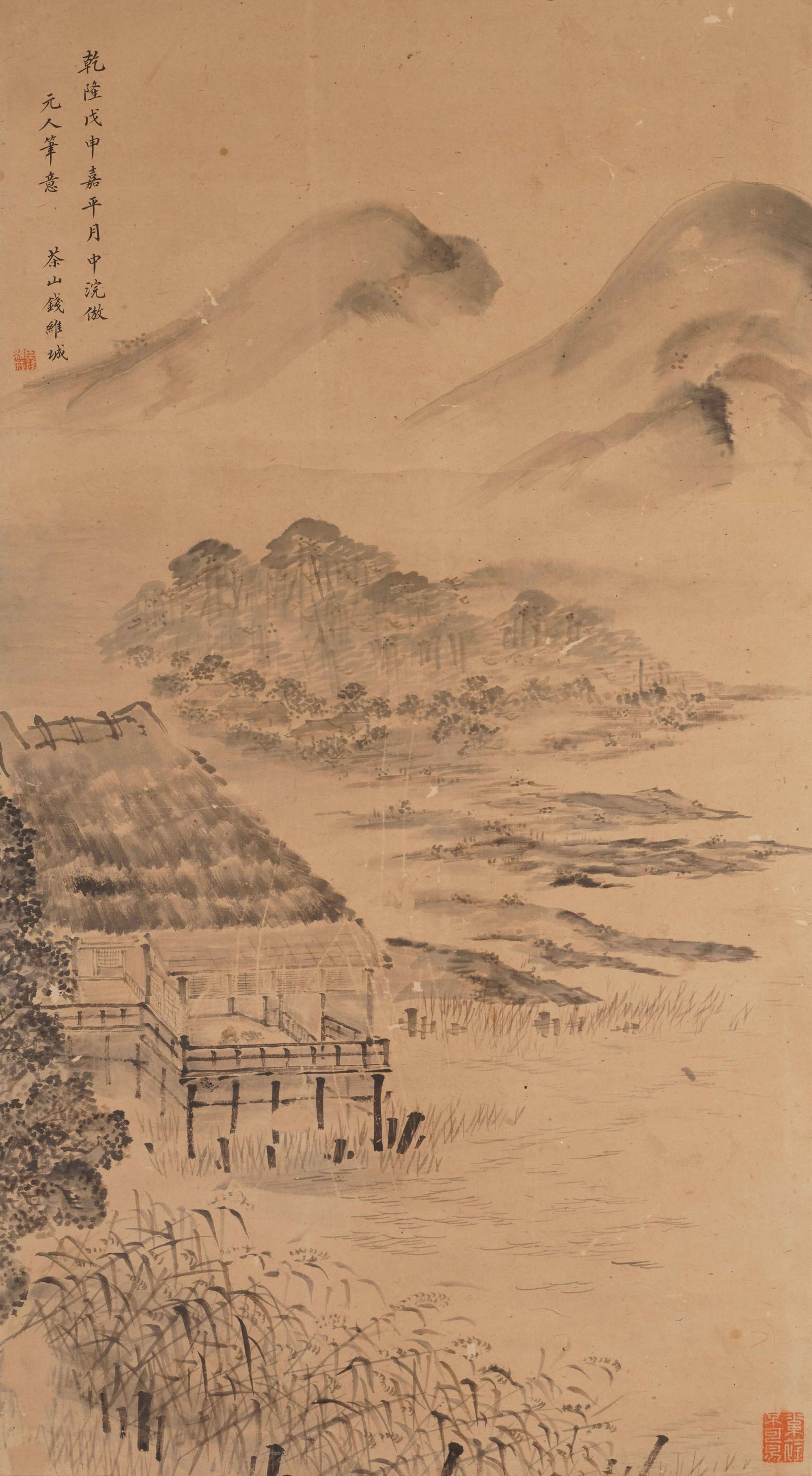A CHINESE PAINTING OF RIVERSIDE COTTAGE, SIGNED QIAN WEICHENG: A CHINESE PAINTING OF RIVERSIDE COTTAGE, SIGNED QIAN WEICHENG Vertical ink wash landscape on aged warm toned paper, inscribed, dated and sealed by Qian Weicheng on the upper left corner. The serene sc
