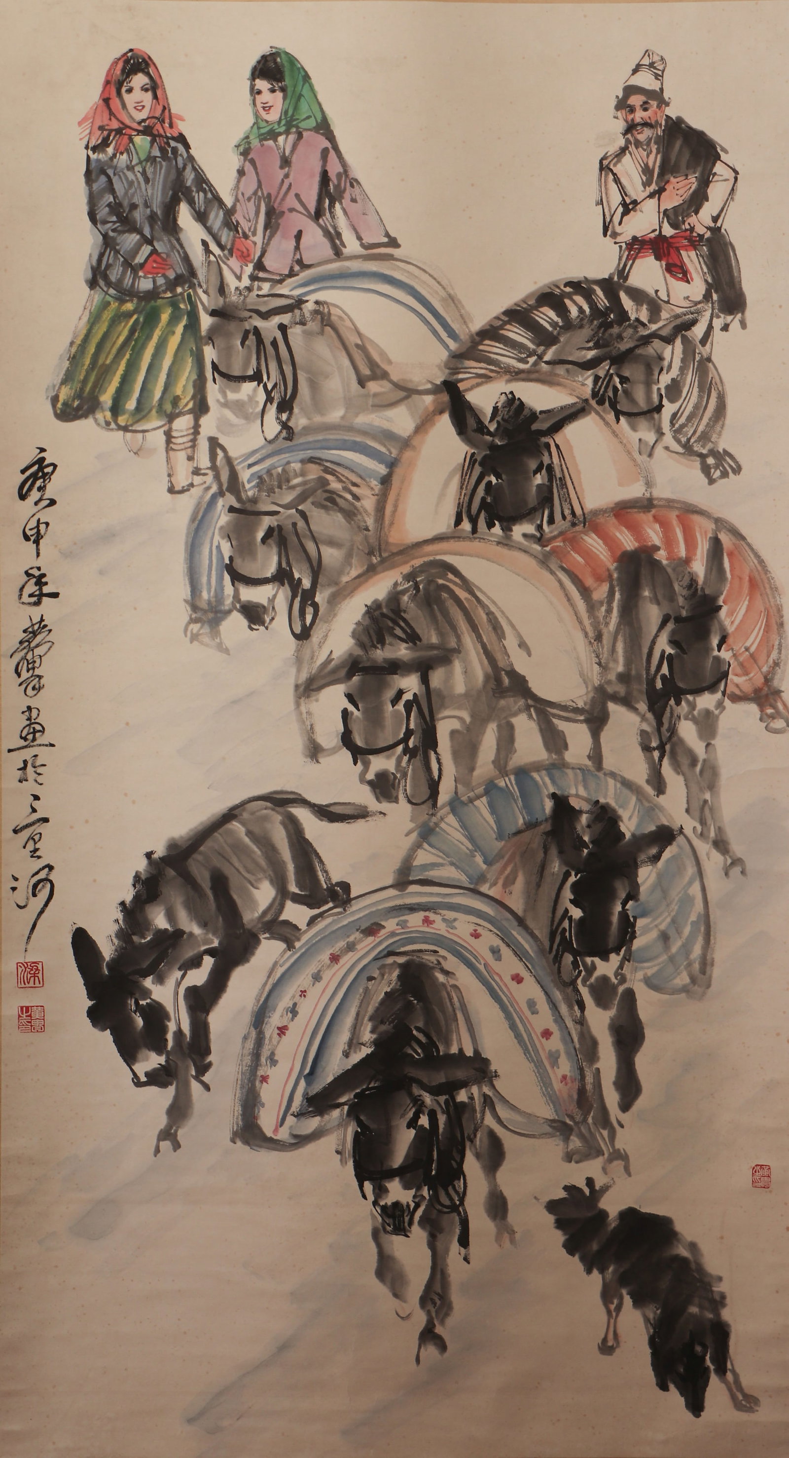 A CHINESE PAINTING OF UYGHUR HERDERS AND DONKEYS, SIGNED HUANG ZHOU: A CHINESE PAINTING OF UYGHUR HERDERS AND DONKEYS, SIGNED HUANG ZHOU Vertical ink and colour genre painting on aged rice paper, dated, inscribed and sealed by Huang Zhou at the left margin. The lively 