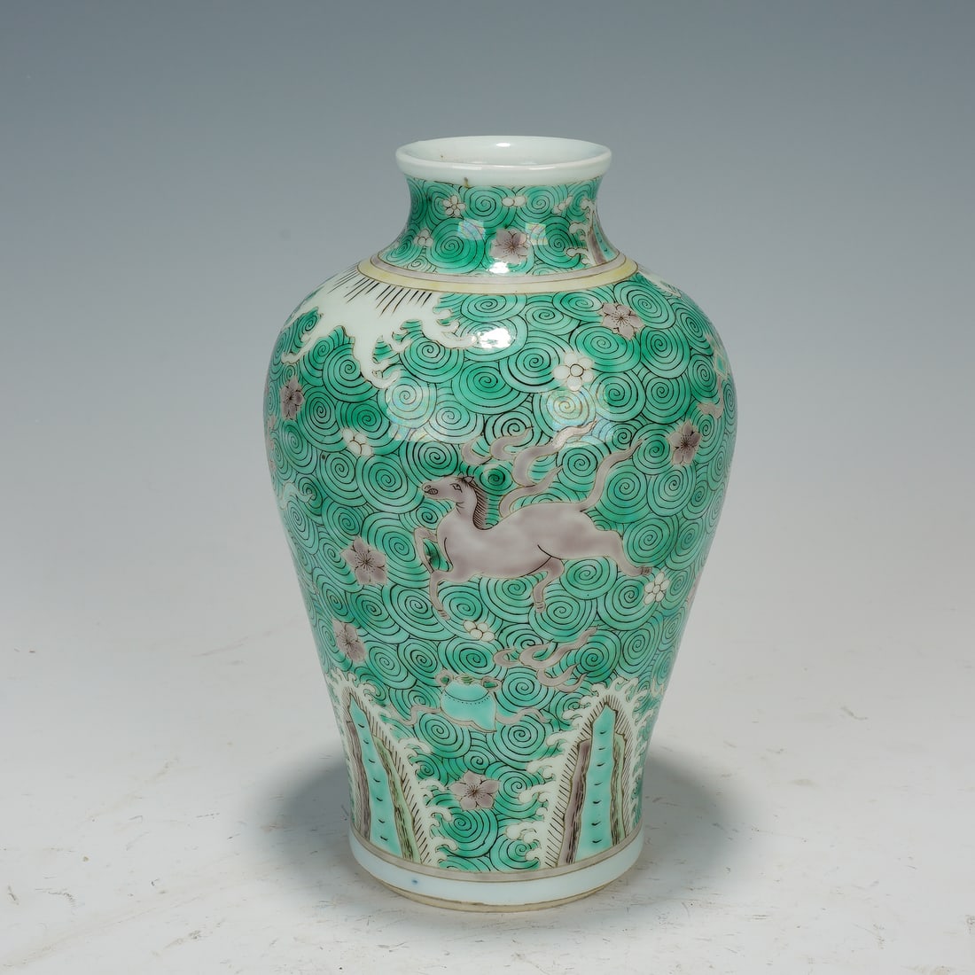 A CHINESE SANCAI MEIPING VASE: A CHINESE SANCAI MEIPING VASE This elegant porcelain meiping vase measures 12 cm across the widest belly and 20 cm in full height. It is decorated in classic famille verte sancai palette dominated by 