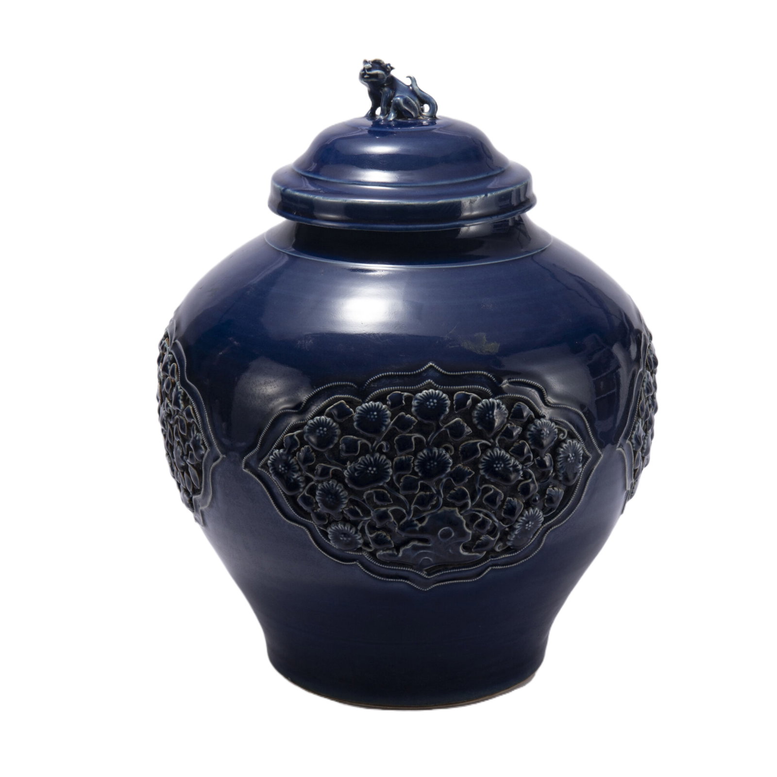 A CHINESE CARVED FLOWERS BLUE GLAZED PORCELAIN LIDDED JAR: A CHINESE CARVED FLOWERS BLUE GLAZED PORCELAIN LIDDED JAR The large pot of flowers has a thick tire, blue glaze like the deep sea, uniform glaze, quiet and bright color, beautiful and dazzling, beauti