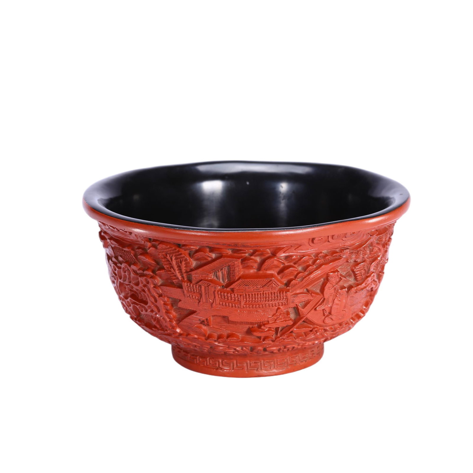 A CHINESE CARVED CINNABAR LACQUER LANDSCAPE BOWL: A CHINESE CARVED CINNABAR LACQUER LANDSCAPE BOWL This rounded bowl is executed in traditional carved red lacquer with a sleek polished black lacquer interior. The outer wall features deep three-dimens