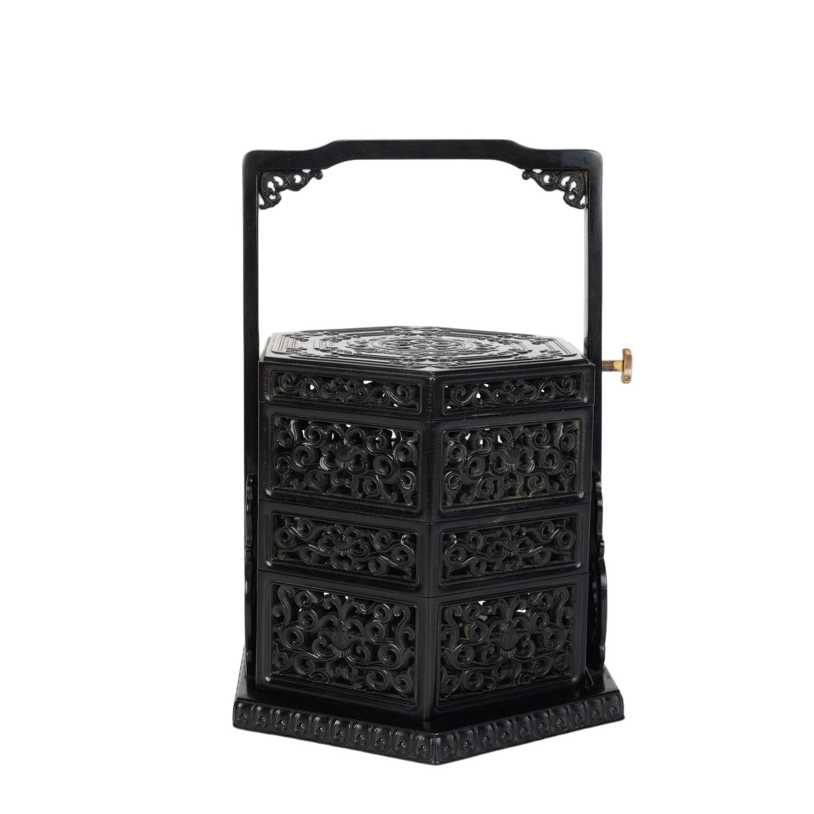 A CHINESE ZITAN WOOD TIERED CARRY BOX: A CHINESE ZITAN WOOD TIERED CARRY BOX This hexagonal multi-tiered zitan wood carrying box measures 18 cm wide and 29 cm tall, constructed from dense dark polished zitan timber with a glossy patinated 