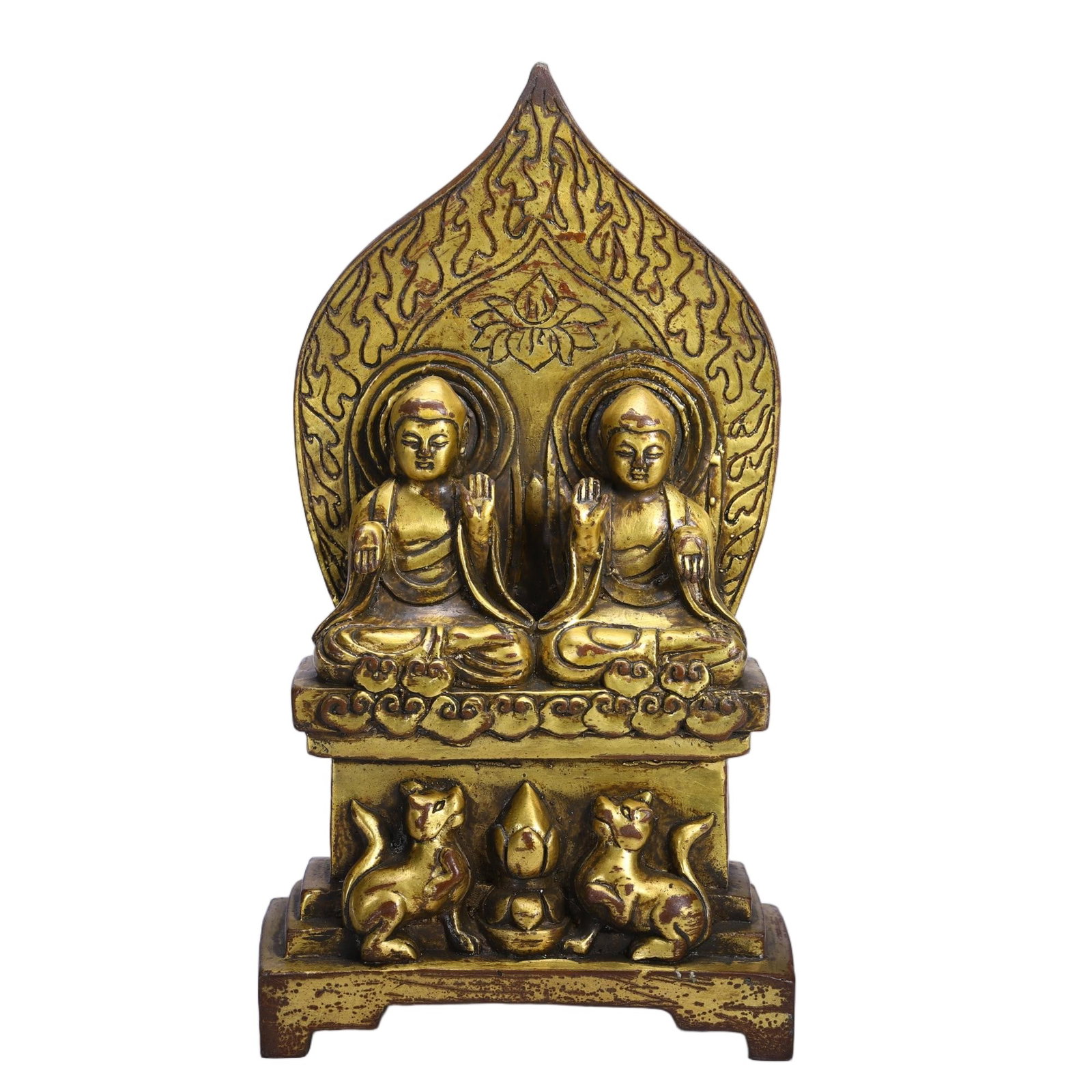 A CHINESE GILT BRONZE TWIN BUDDHA SHRINE: A CHINESE GILT BRONZE TWIN BUDDHA SHRINE This complete devotional shrine is cast in bronze and finished with warm gilding with subtle patina and wear across the surface. Two identical Buddhas sit in f