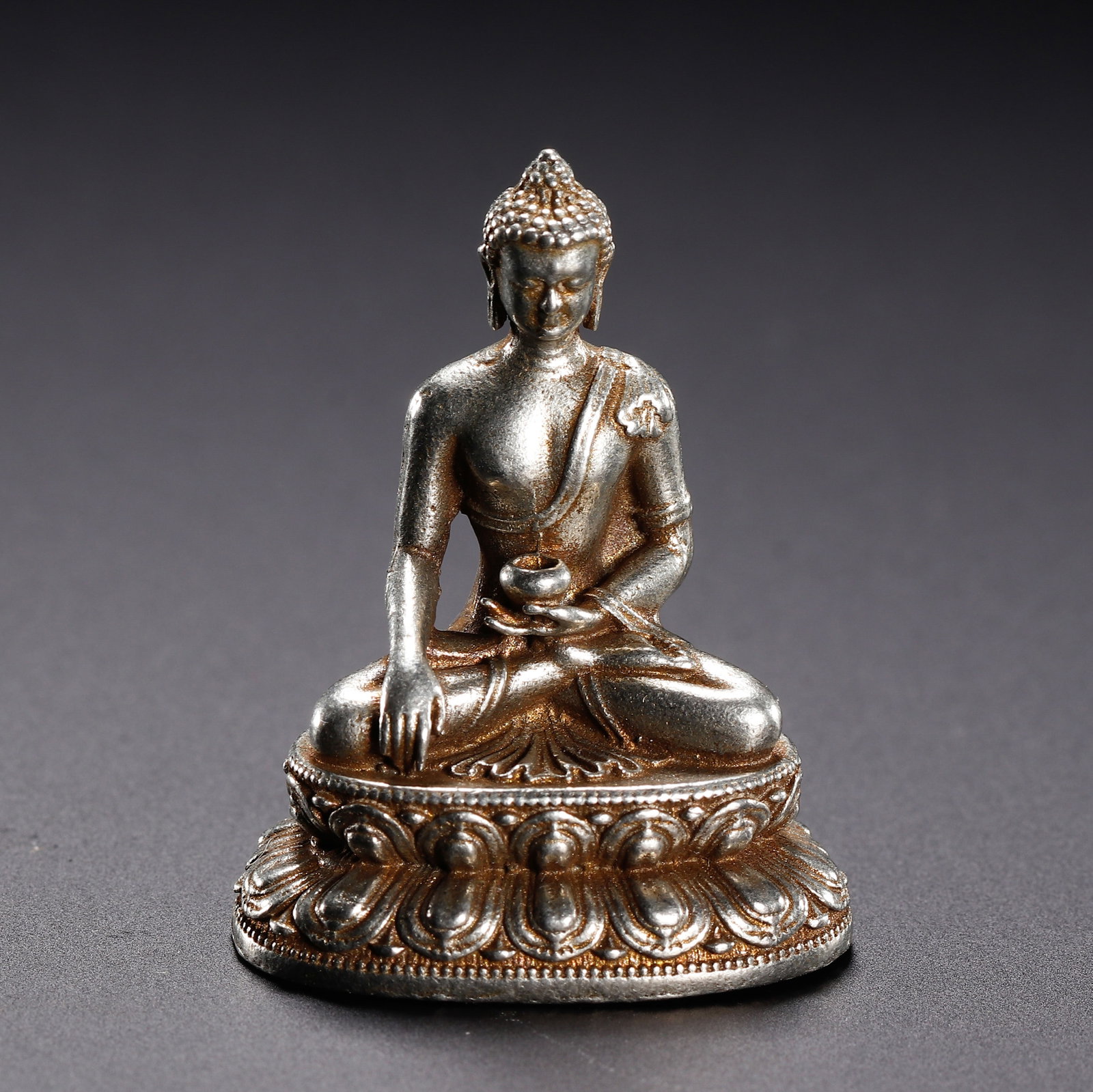 A CHINESE SILVERED COPPER MEDICINE BUDDHA STATUE (1 of 9)
