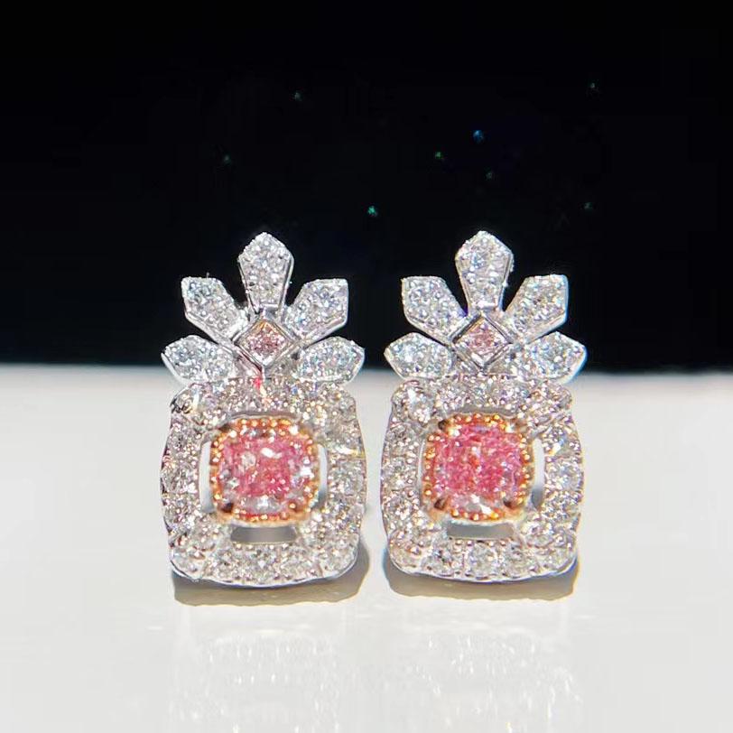 14K White Gold 0.27 CTW Natural Pink Diamond Earrings with Certificate: Ref:2022819033 Gold Content:14K White Gold For people:Women Main Gemstone:Pink Diamond Number of Gemstone:2 Shape:Cushion Carat Weight:0.13ct Color:Fancy Pink Cut Grade:G Adjacent Gemstone 2 : Dia