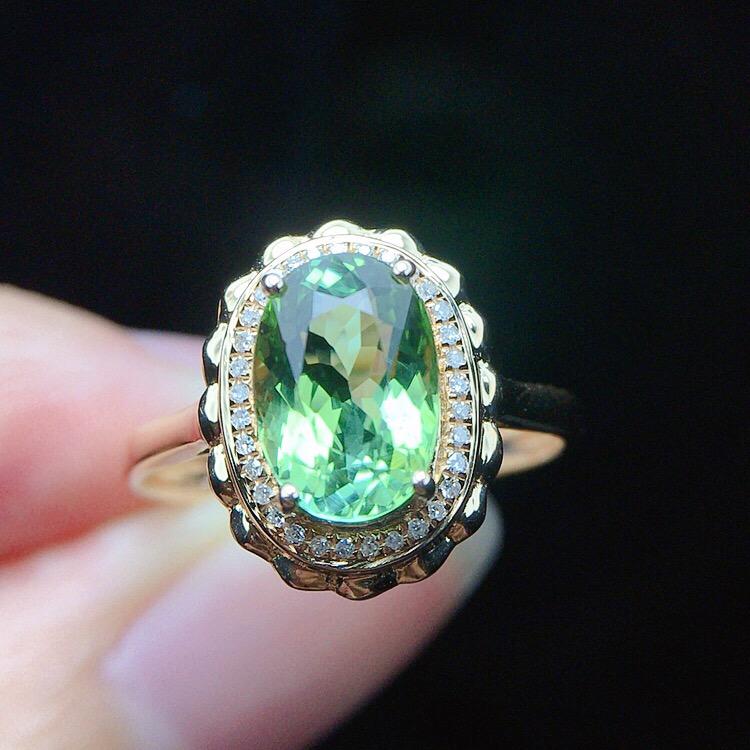 14K Rose Gold 1.7 CT Tourmaline & Diamond Ring: Ref:2022828657 Gold Content:14K Rose Gold For people:Women Total Item Weight:2.3grams Ring Size:7.25US Main Stone:Tourmaline Number of stones:1 Shape:Oval Carat Total Wt:1.7ct Color:Green Cut Grade:G
