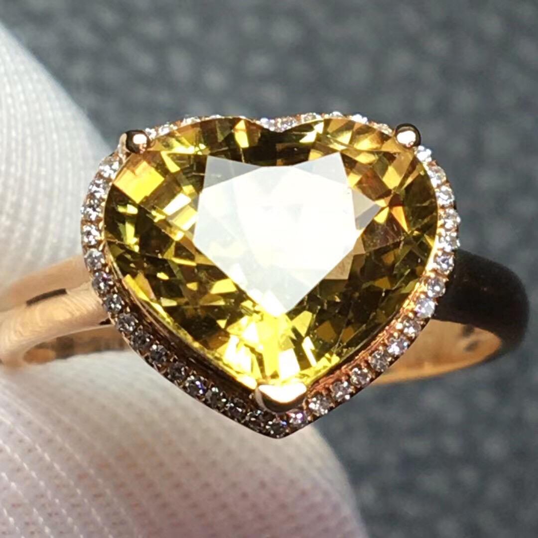 14K Rose Gold 3.2 CT Tourmaline & Diamond Ring: Ref:2022904179 Gold Content:14K Rose Gold For people:Women Ring Size:7.25US Main Stone:Tourmaline Number of stones:1 Shape:Heart Carat Total Wt:3.2ct Color:Green Cut Grade:G Adjacent Gems