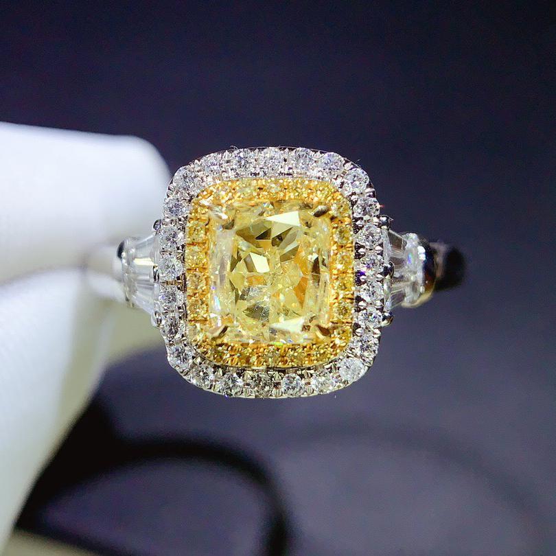 14K White Gold 1.07 CTW Natural Yellow Diamond Ring with Certificate: Ref:1000070 Gold Content:14K White Gold For people:Women Ring Size:7.25US Main Gemstone: Yellow Diamond Number of Gemstone:1 Shape:Cushion Carat Weight:1.07ct Color:Yellow Cut Grade:G Adjacent