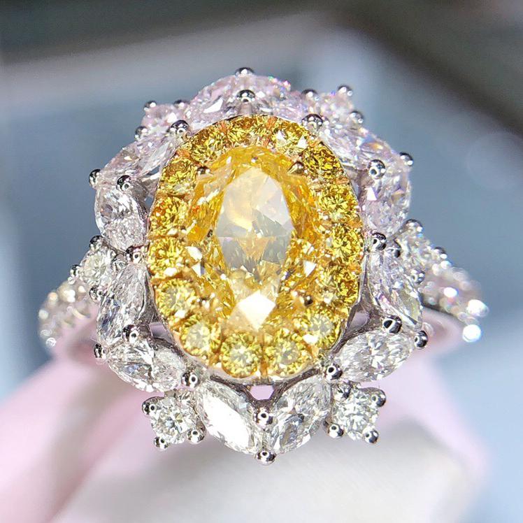 14K White Gold 2.1 CTW Natural Yellow Diamond Ring with Certificate: Ref:1000073 Gold Content:14K White Gold For people:Women Ring Size:7.25US Main Gemstone: Yellow Diamond Number of Gemstone:1 Shape:Oval Carat Weight:1.6ct Color:Yellow Cut Grade:G Adjacent Gem