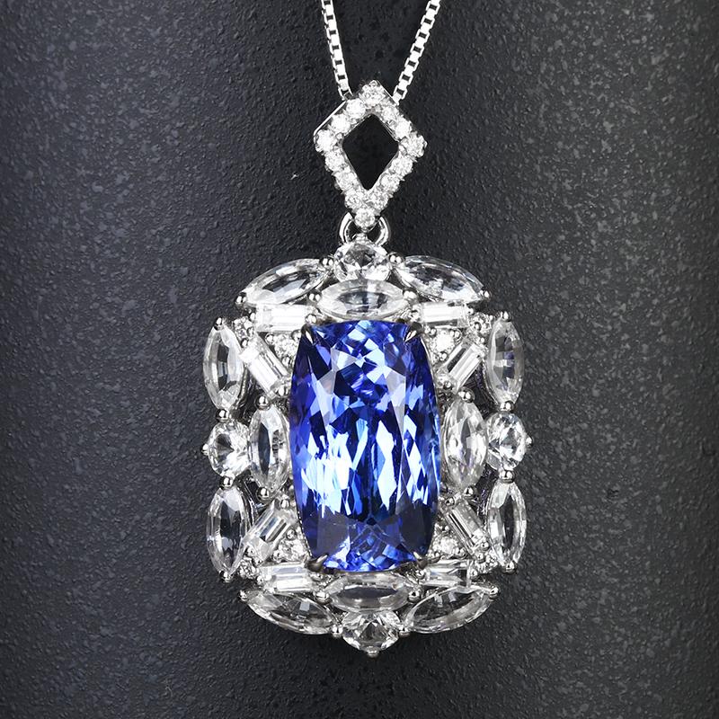 14K White Gold 4.41 CTW Tanzanite & Diamond Pendant: Ref:1000169 Gold Content:14K White Gold For people:Women Total Item Weight:4.64grams Ring Size:Approxiate30*17.4*1000mm Main Stone:Tanzanite Number of stones:1 Shape:Cushion Carat Total Wt:4.26ct Colo