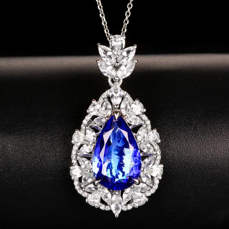14K White Gold 3.52 CTW Tanzanite & Diamond Pendant: Ref:1115189 Gold Content:14K White Gold For people:Women Total Item Weight:3.43grams Main Stone:Tanzanite Number of stones:1 Shape:Pear Carat Total Wt:3.44ct Color: Cut Grade:G Adjacent Gemst