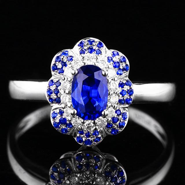 18K White Gold 0.737 CTW Sapphire & Sapphire Ring: Ref:23328528 Gold Content:18K White Gold Ring Size:7.25us Main Gemstone:Sapphire Number of stones:1 Shape:Oval Carat Weight:0.58ct Color:Blue Cut Grade:G Adjacent Gemstone 2 : Sapphire Nu