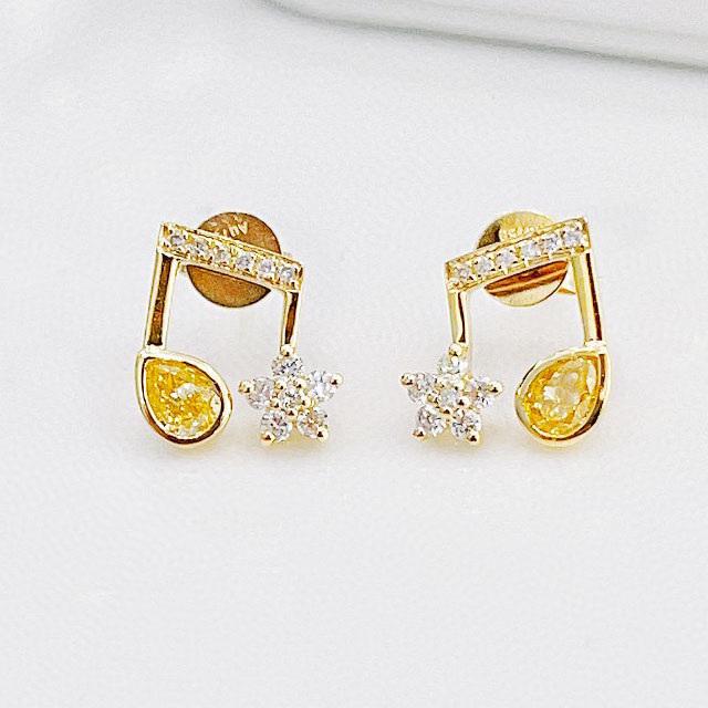 14K GOLD 0.52 CTW NATURAL YELLOW DIAMOND & DIAMOND EARRINGS: Ref:230525731 Gold Content:14K Gold Main Gemstone:Yellow Diamond Number of stones:2 Shape:Pear Carat Weight:0.34ct Color:Yellow Treatment:Natural Cut Grade:G Adjacent Gemstone 2 : Diamond Shap