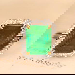 14K GOLD 4.1 CTW VIVID GREEN NATURAL EMERALD & DIAMOND RING: Ref:230635112 Gold Content:14K Gold Ring Size:7.25US Main Gemstone:Emerald Number of stones:1 Shape:Octagonal Carat Weight:3.6ct Color:Vivid Green Treatment:Natural Cut Grade:G Adjacent Gemsto