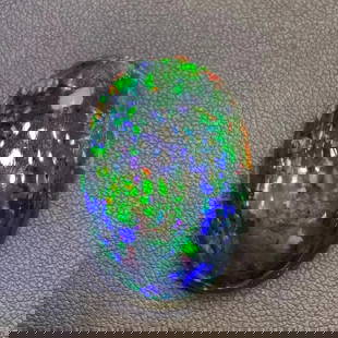 CERTIFIED 47.54 CT NATURAL BLACK OPAL LOOSE STONE: Ref:230651054 Ring Size:31*21.5*13.5mm Main Gemstone:Opal Number of stones:1 Shape:Oval Carat Weight:47.54ct Color:Black Treatment:Natural Cut Grade:G