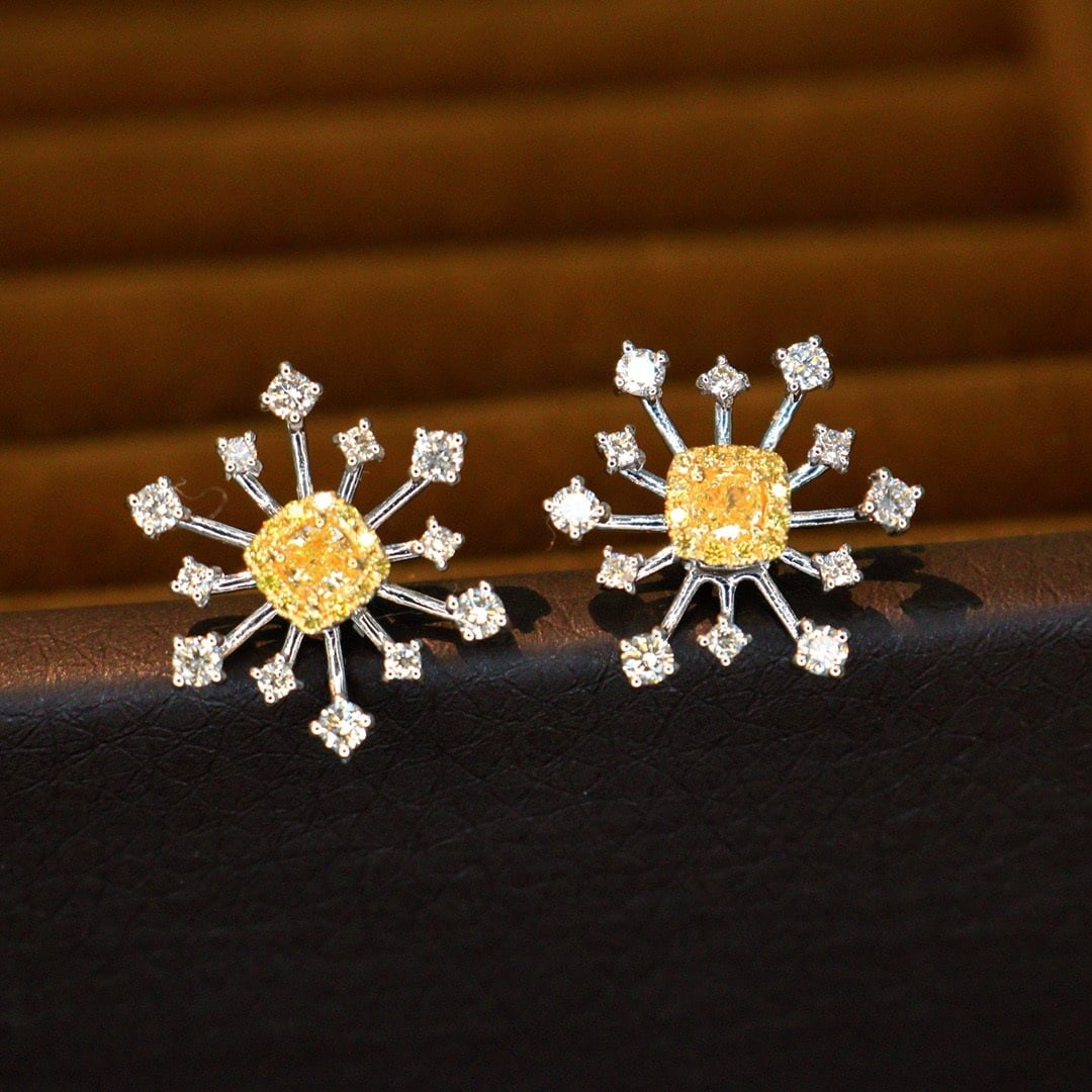 14K GOLD 0.80 CTW NATURAL YELLOW DIAMOND & DIAMOND EARRINGS: Ref:230685002 Gold Content:14K Gold Main Gemstone:Yellow Diamond Number of stones:2 Shape:Cushion Carat Weight:0.26ct Color:Yellow Treatment:Natural Cut Grade:G Adjacent Gemstone 2 : Diamond S