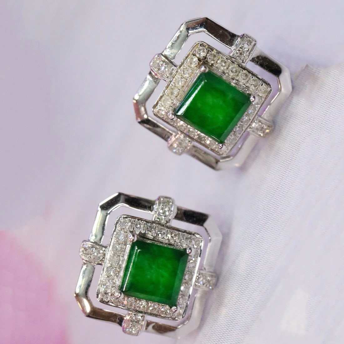 14K GOLD 0.53 CTW VIVID GREEN NATURAL EMERALD & DIAMOND EARRINGS: Ref:230769072 Gold Content:14K Gold Main Gemstone:Emerald Number of stones:2 Shape:Square Carat Weight:0.28ct Color:Vivid Green Treatment:Natural Cut Grade:G Adjacent Gemstone 2 : Diamond Shap
