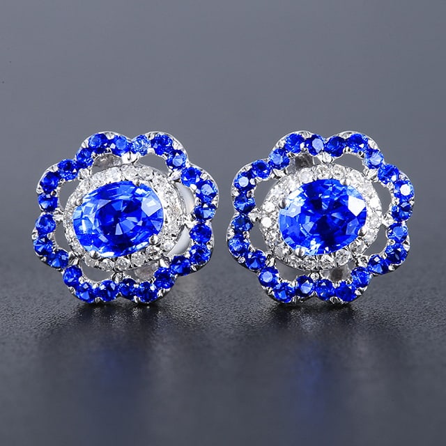 14K GOLD 3.55 CTW VIVID BLUE NATURAL SAPPHIRE & DIAMOND EARRINGS: Ref:230804125 Gold Content:14K Gold Main Gemstone:Sapphire Shape:Multiply Carat Weight:3.44ct Color:Vivid Blue Treatment:Natural Adjacent Gemstone 2 : Diamond Number of stones:38 Shape:Round C