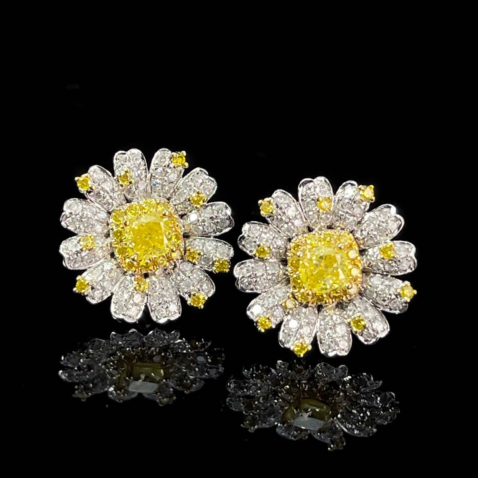 14K WHITE GOLD 1.15 CTW NATURAL YELLOW DIAMOND & DIAMOND EARRINGS: Ref:230811135 Gold Content:14K White Gold Main Gemstone:Yellow Diamond Number of stones:2 Shape:Cushion Carat Weight:0.40ct Color:Yellow Treatment:Natural Cut Grade:G Adjacent Gemstone 2 : Diamond