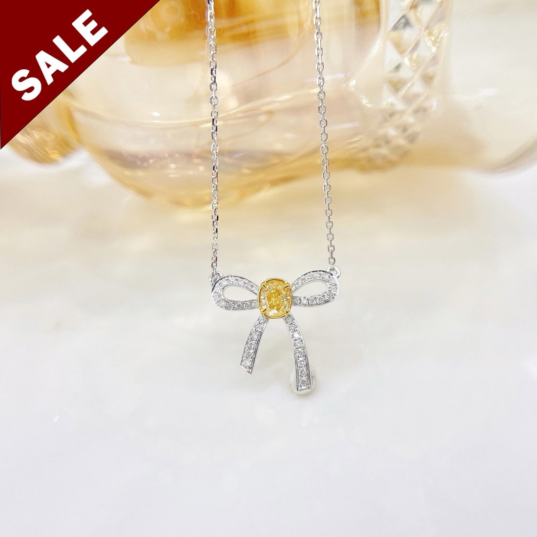 14K GOLD 0.38 CTW NATURAL YELLOW DIAMOND & DIAMOND NECKLACE: Ref:230794038 Gold Content:14K Gold Main Gemstone:Yellow Diamond Number of stones:1 Shape:Oval Carat Weight:0.27ct Color:Yellow Treatment:Natural Adjacent Gemstone 2 : Diamond Shape:Round Cara