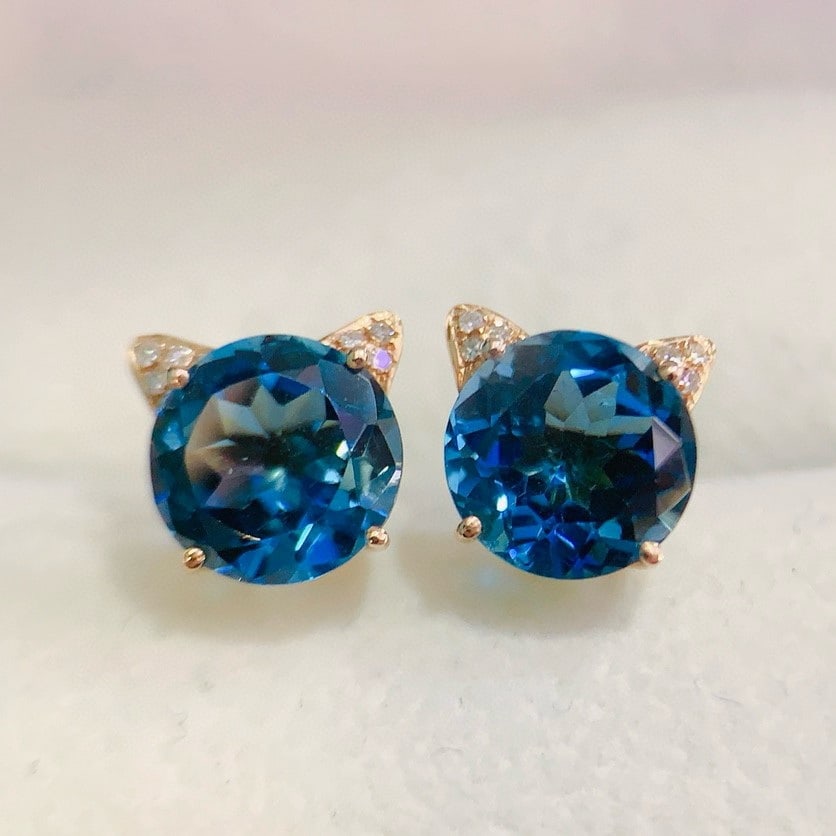 14k Gold 4.4 Ct Natural Topaz & Diamond Earrings: Ref:230890251 / goldcontent:14kgold / maingemstone:topaz / shape:round / caratweight:4. 4ct / color:blue / treatment:natural / cutgrade:g / adjacentgemstone2:diamond / numberofstones:12 / shape:round 