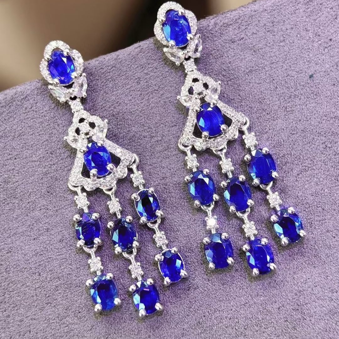 14k Gold 3.8 Ct Vivid Blue Natural Sapphire & Diamond Earrings: Ref:230933159 // gold content:14k gold // main gemstone:sapphire // shape:oval // carat weight:3. 8ct // color:vivid blue // treatment:natural // // adjacent gemstone 2 : diamond // shape:round // cla
