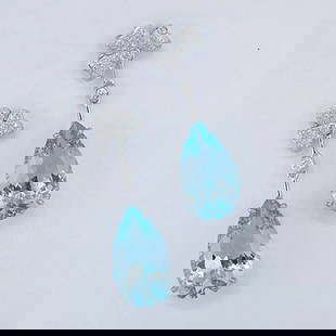 14K GOLD 11.00 CTW NATURAL AQUAMARINE & DIAMOND EARRINGS: Ref:230910247 Gold Content:14K Gold Main Gemstone:Aquamarine Shape:Pear Carat Weight:10.65ct Color:Santa Maria Color Treatment:Natural Adjacent Gemstone 2 : Diamond Shape:Round Carat Weight:0.35ct