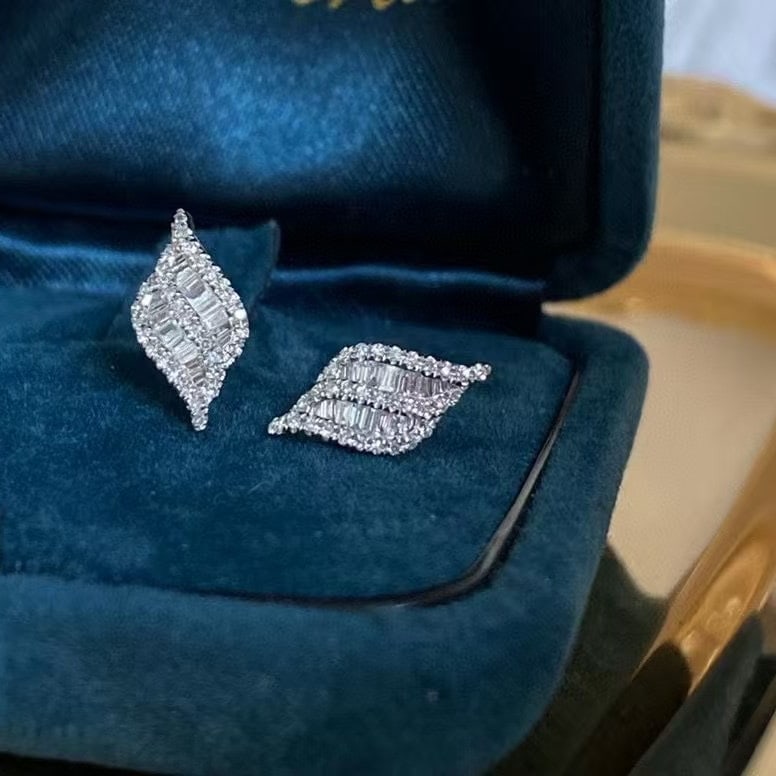 14k Gold 0.24 Ct Natural H Diamond Earrings: Ref:231005214 // gold content:14k gold // main gemstone:diamond // shape:multiply // carat weight:0. 24ct // clarity grade:vs-si // color:h // treatment:natural // Condition: New Low Estimate: 1100 Hi
