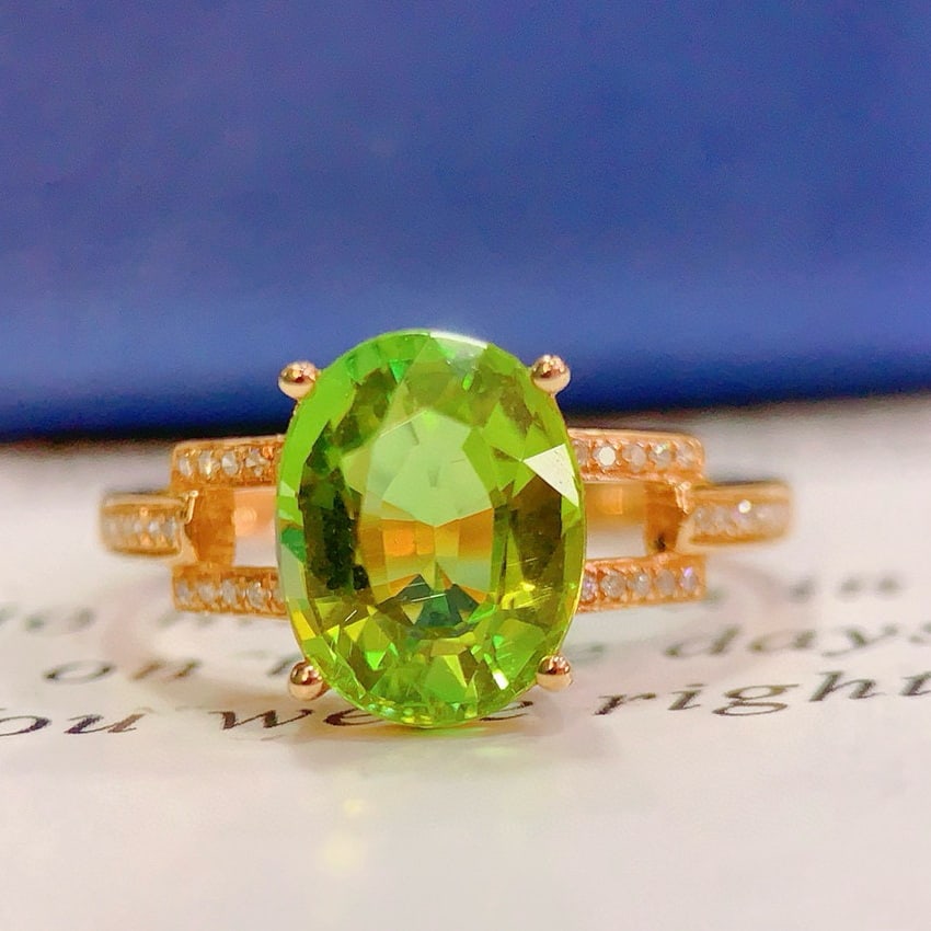14k Gold 2.8 Ct Natural Tourmaline & Diamond Ring: Ref:230890256 // gold content:14k gold // ring size:7. 25us // // main gemstone:tourmaline // shape:oval // carat weight:2. 8ct // color:green // treatment:natural // // adjacent gemstone 2 : diamond 