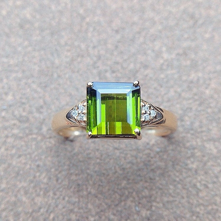 14k Gold 2.7 Ct Natural Tourmaline & Diamond Ring: Ref:230890343 // gold content:14k gold // ring size:7. 25us // // main gemstone:tourmaline // shape:octagonal // carat weight:2. 7ct // color:green // treatment:natural // // adjacent gemstone 2 : dia
